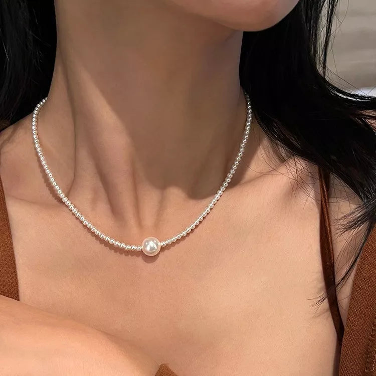 White pearl bead choker necklace, back view