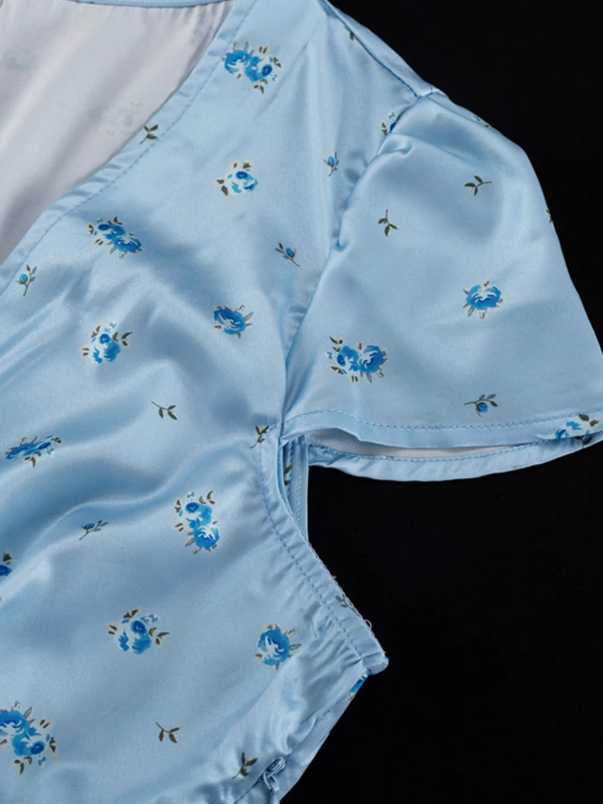 Light blue maxi dress shown from a seated angle