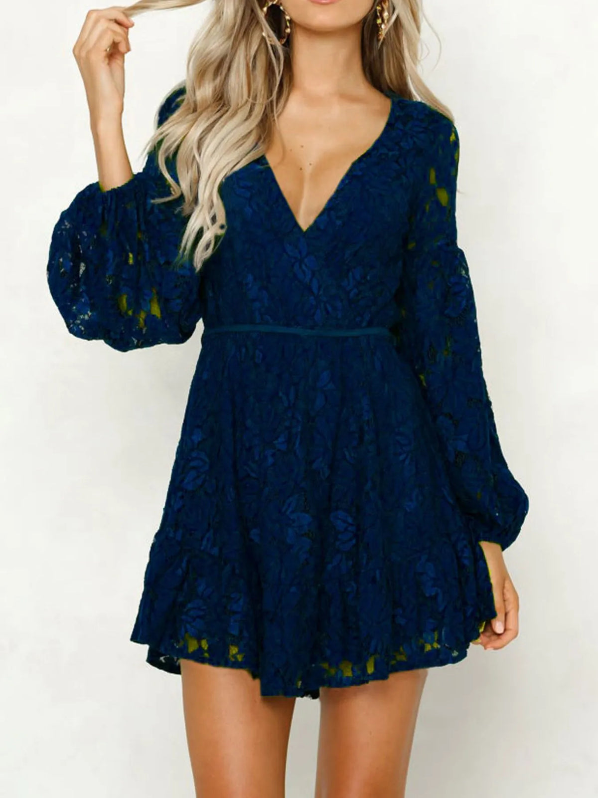 Lace mini dress styled with heels