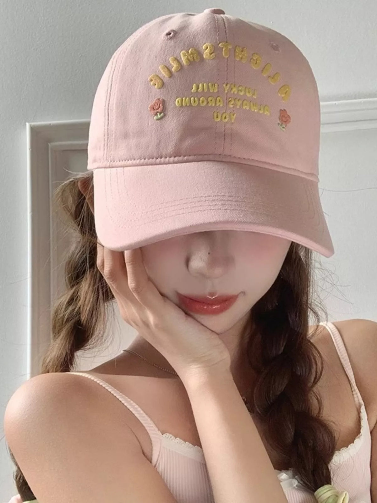 Baseball cap shown from the front in a light colorway