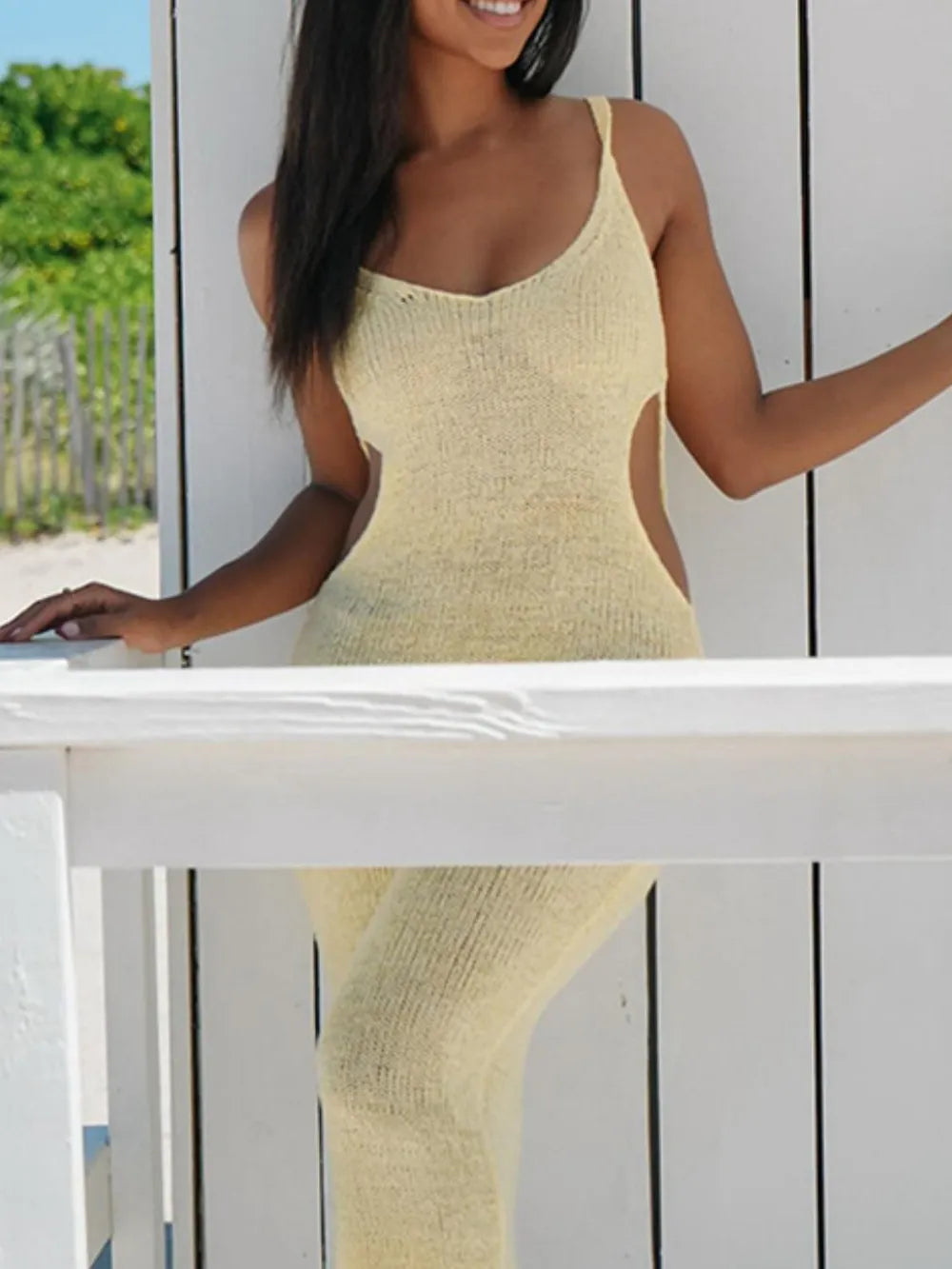 Sheer cover up dress styled over swimsuit