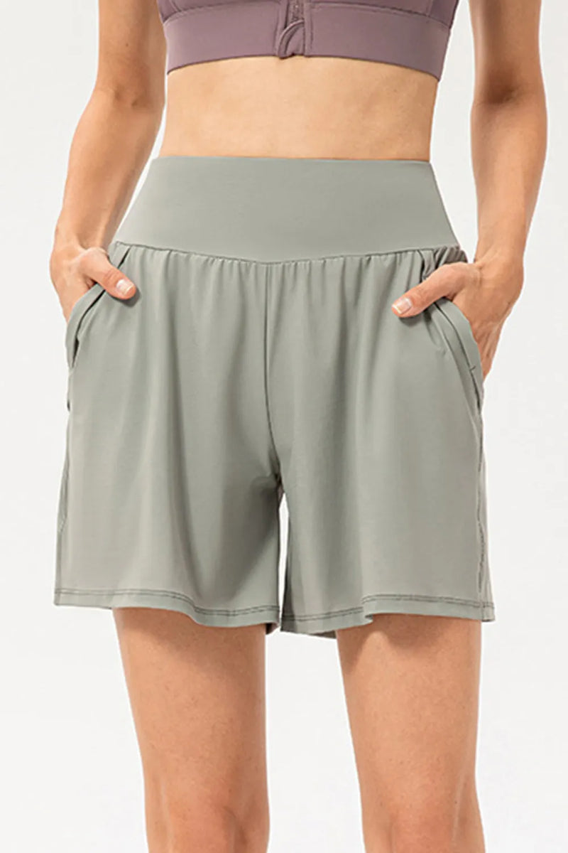 Pocketed elastic waist active shorts front view