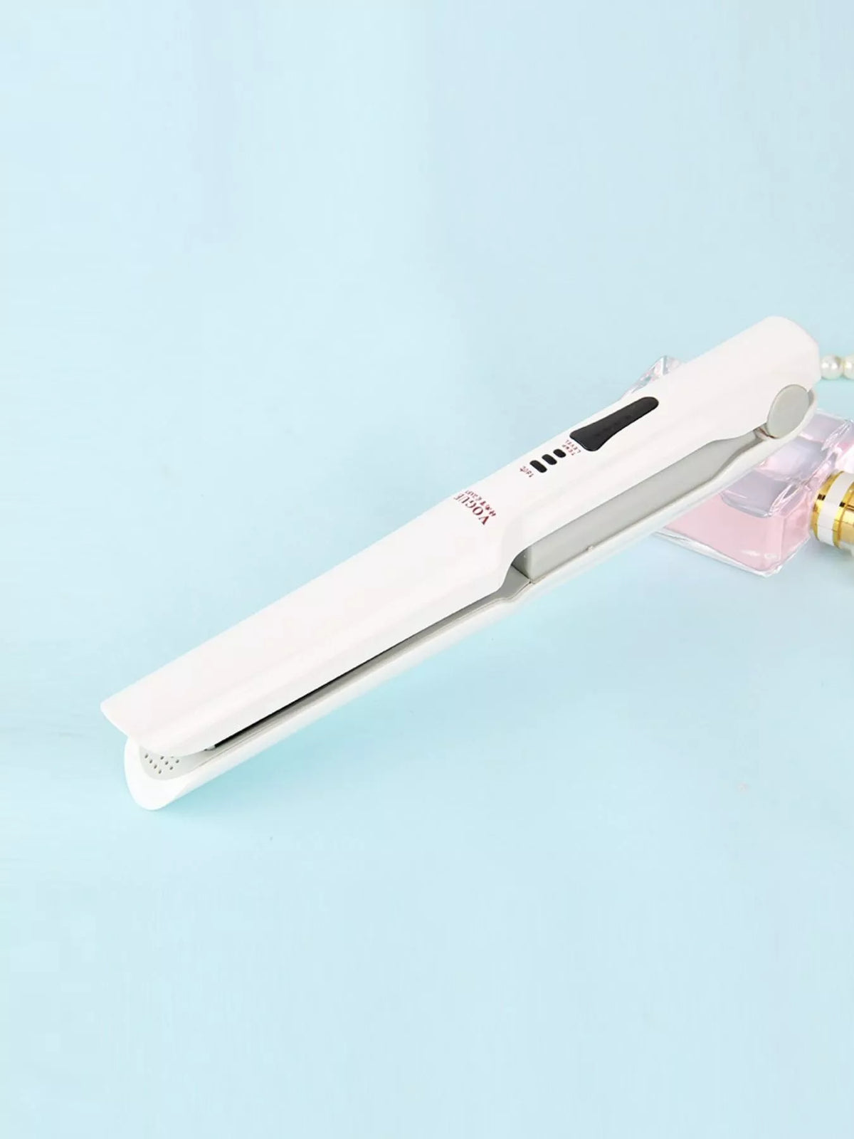 Portable hair straightener packaged