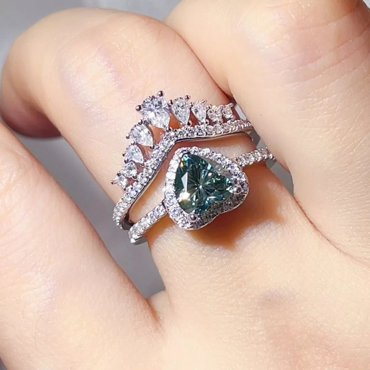 Two piece heart crown ring set worn on the hand