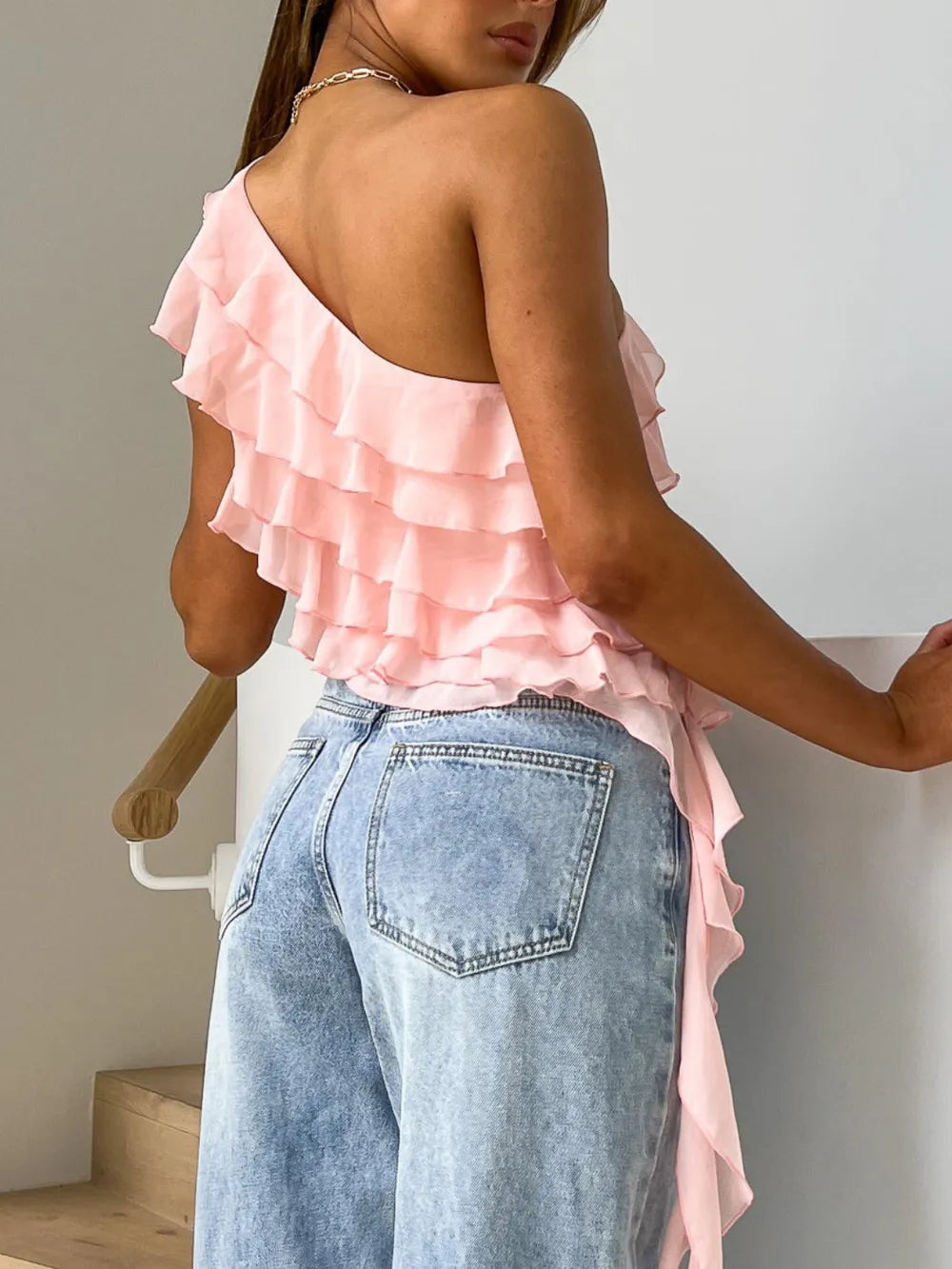 One shoulder tank top in black side view