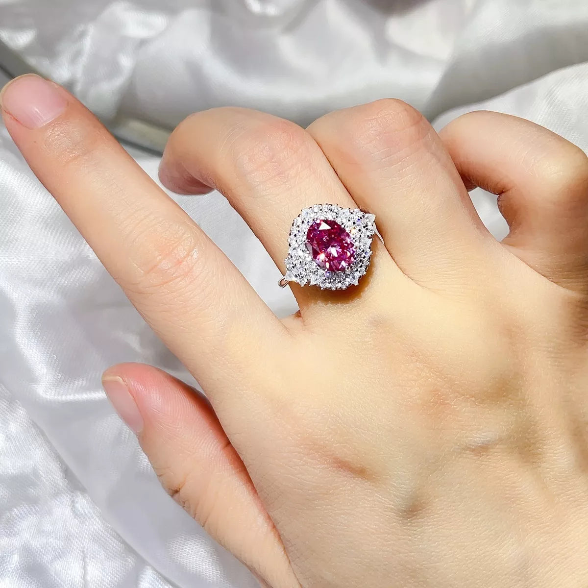 Starglow 2 carat fuchsia pink moissanite ring in sterling silver, front view