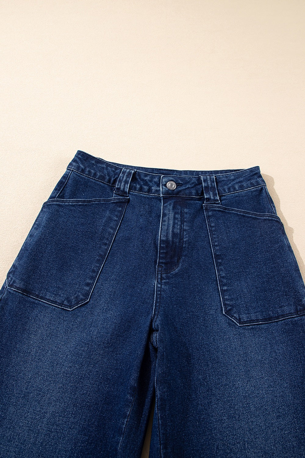 Mid rise straight jeans posed on model