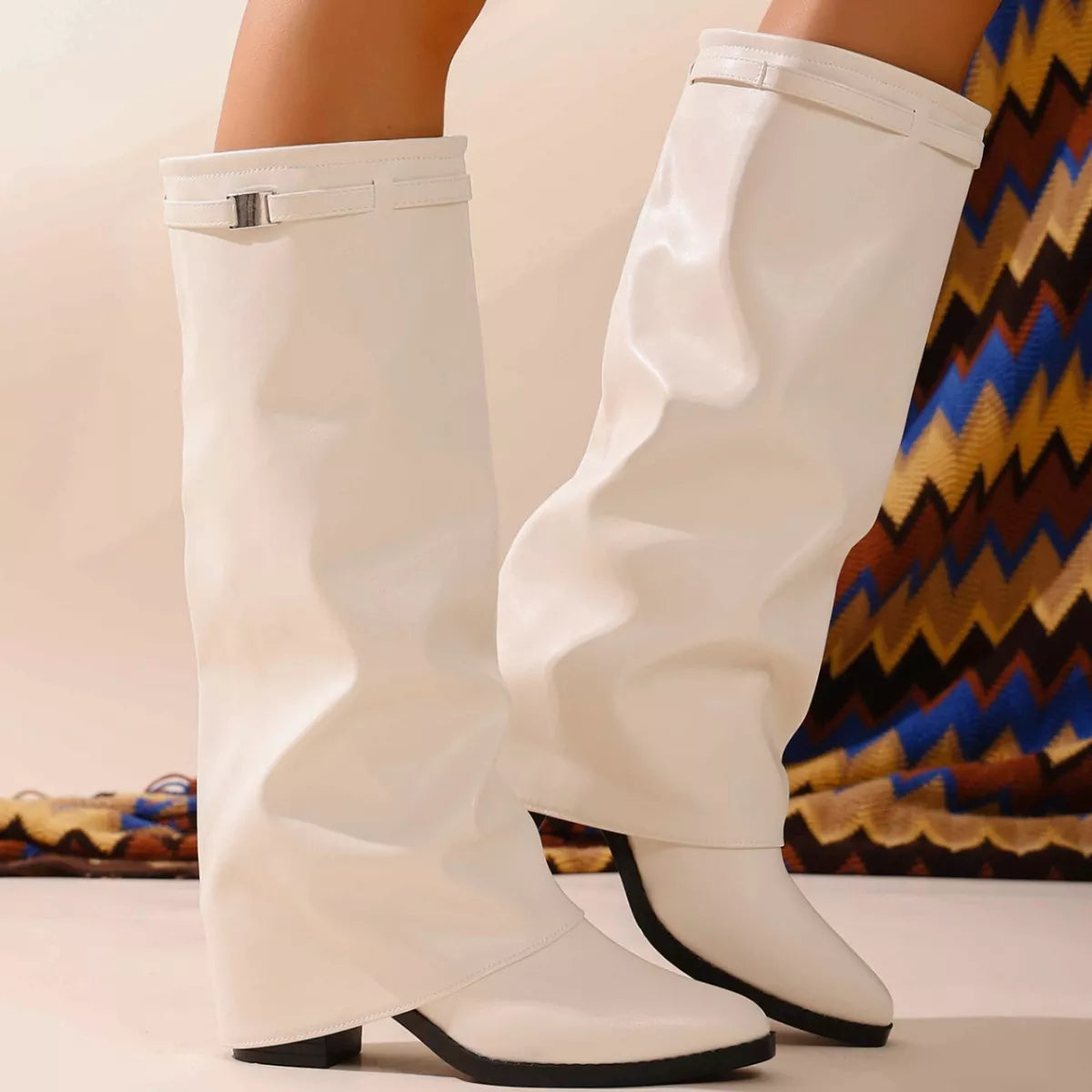 Pointed toe block heel boots paired with denim