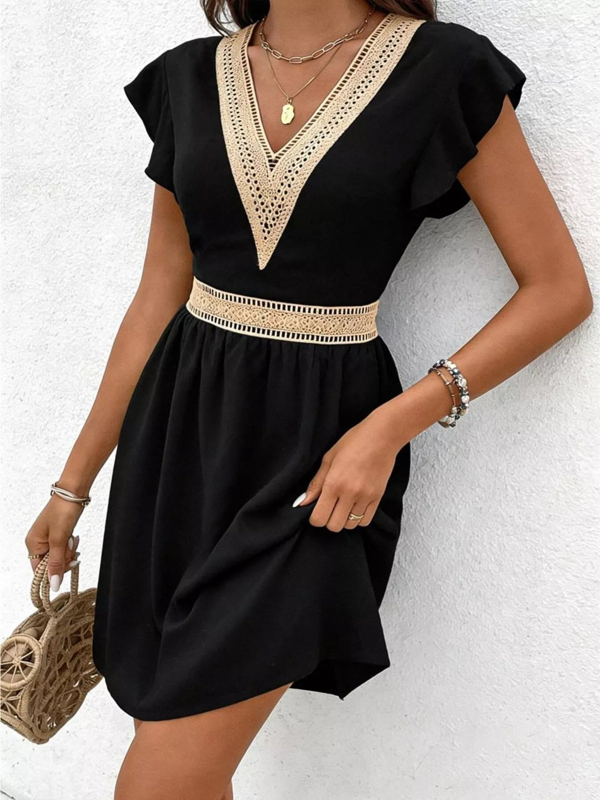 V neck ruffle sleeve mini dress, three quarter view
