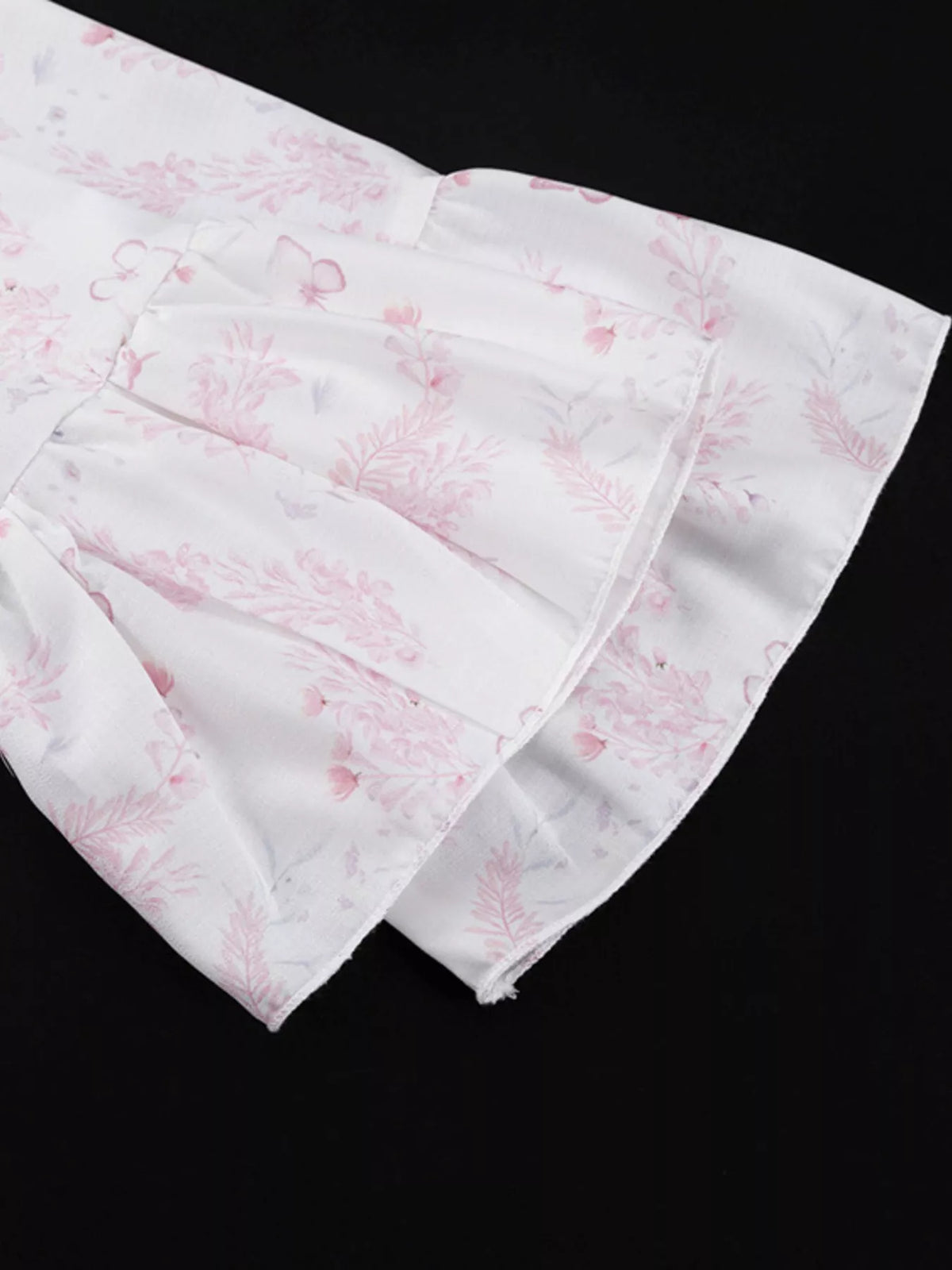 Three quarter view of the floral print dress