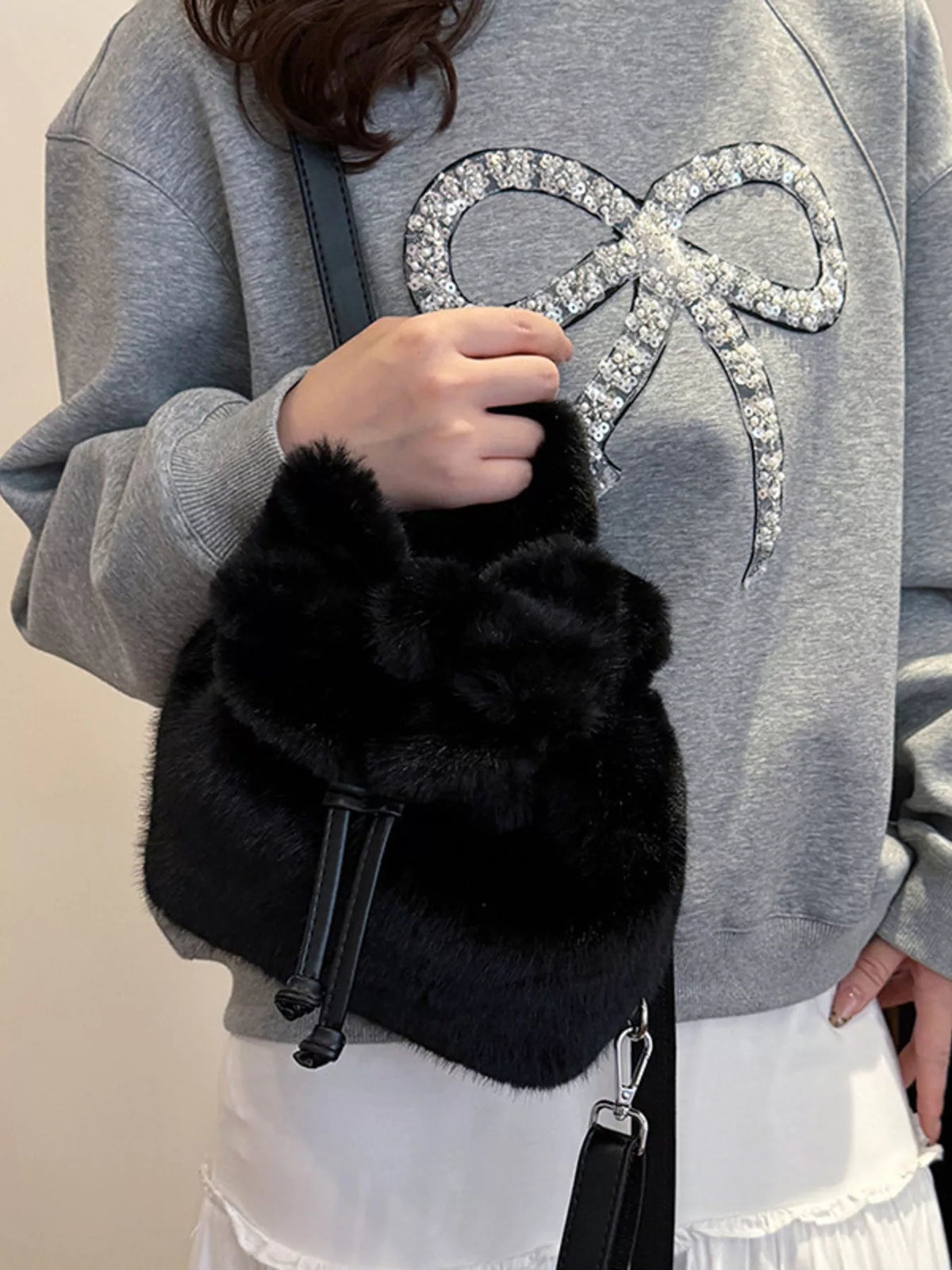 Fuzzy backpack in brown front view