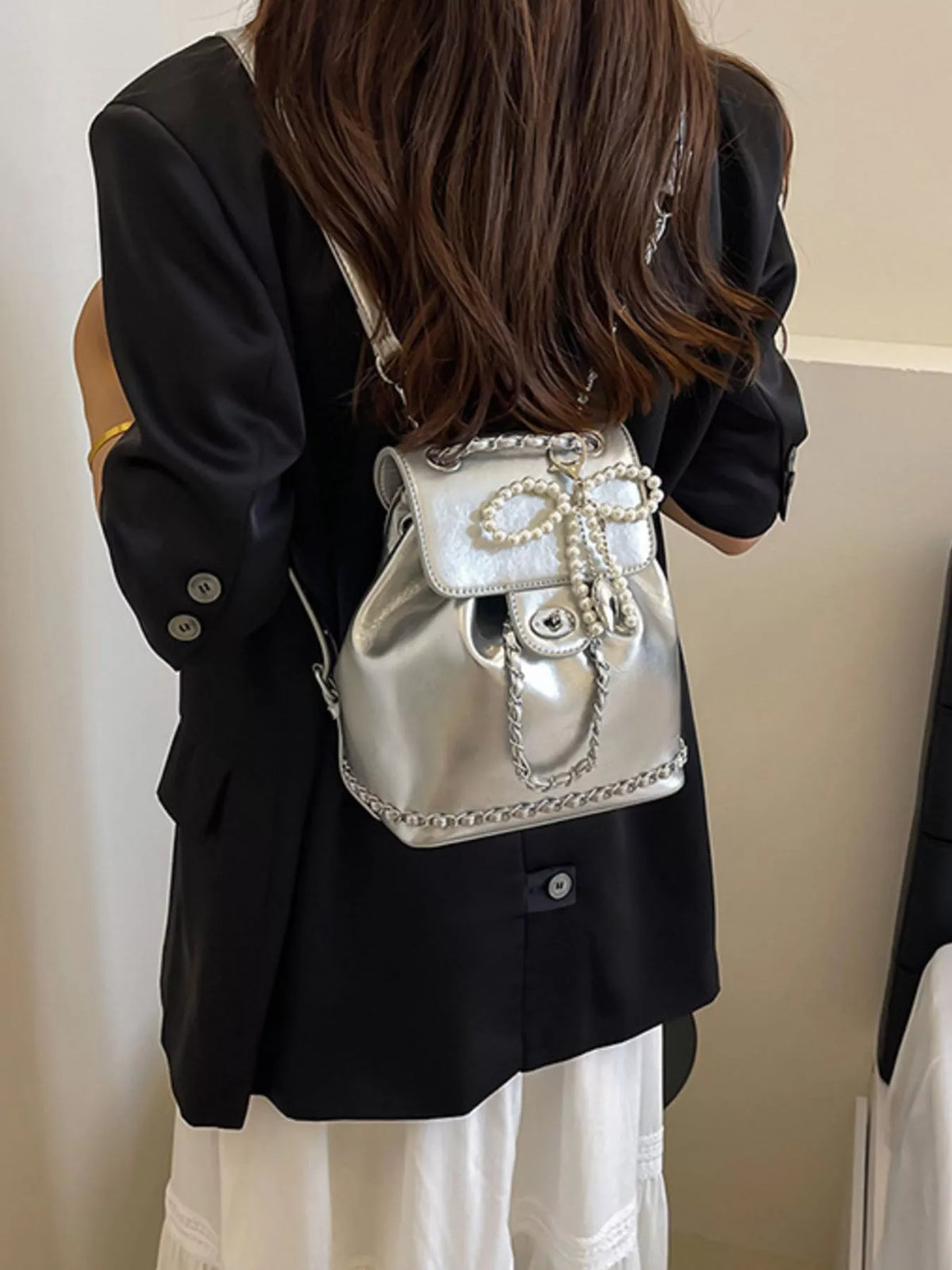 silver pearl mini backpack styled with a casual outfit