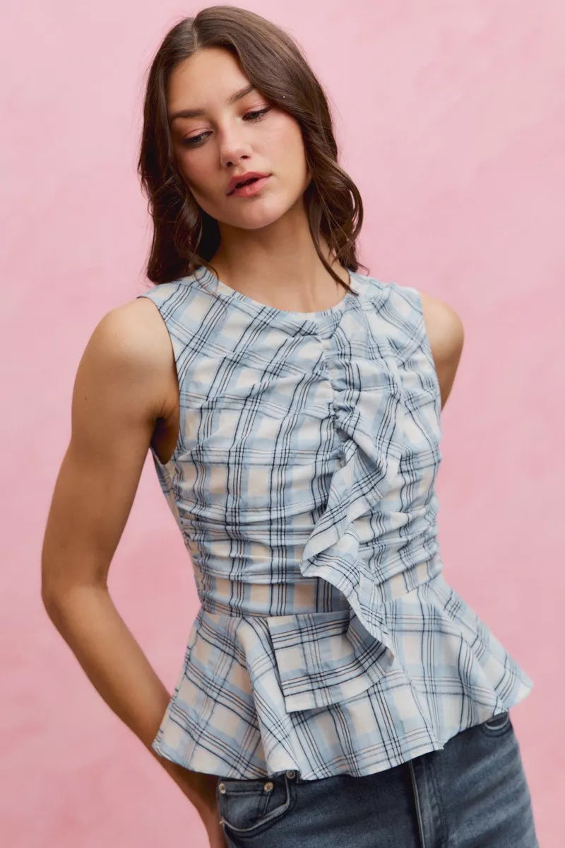 Blue plaid sleeveless ruffle peplum top front view