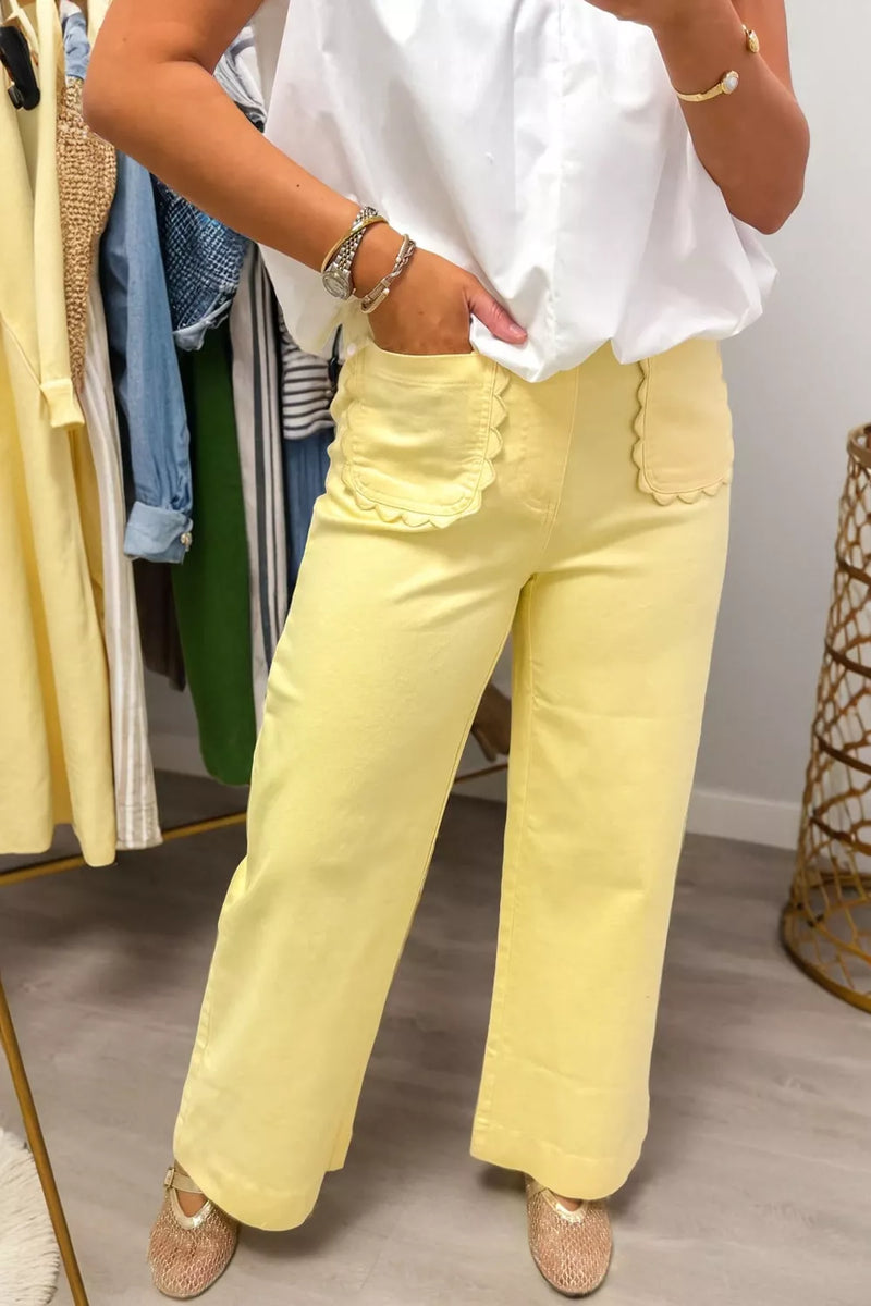 Scalloped patch pocket shift jeans pastel yellow front