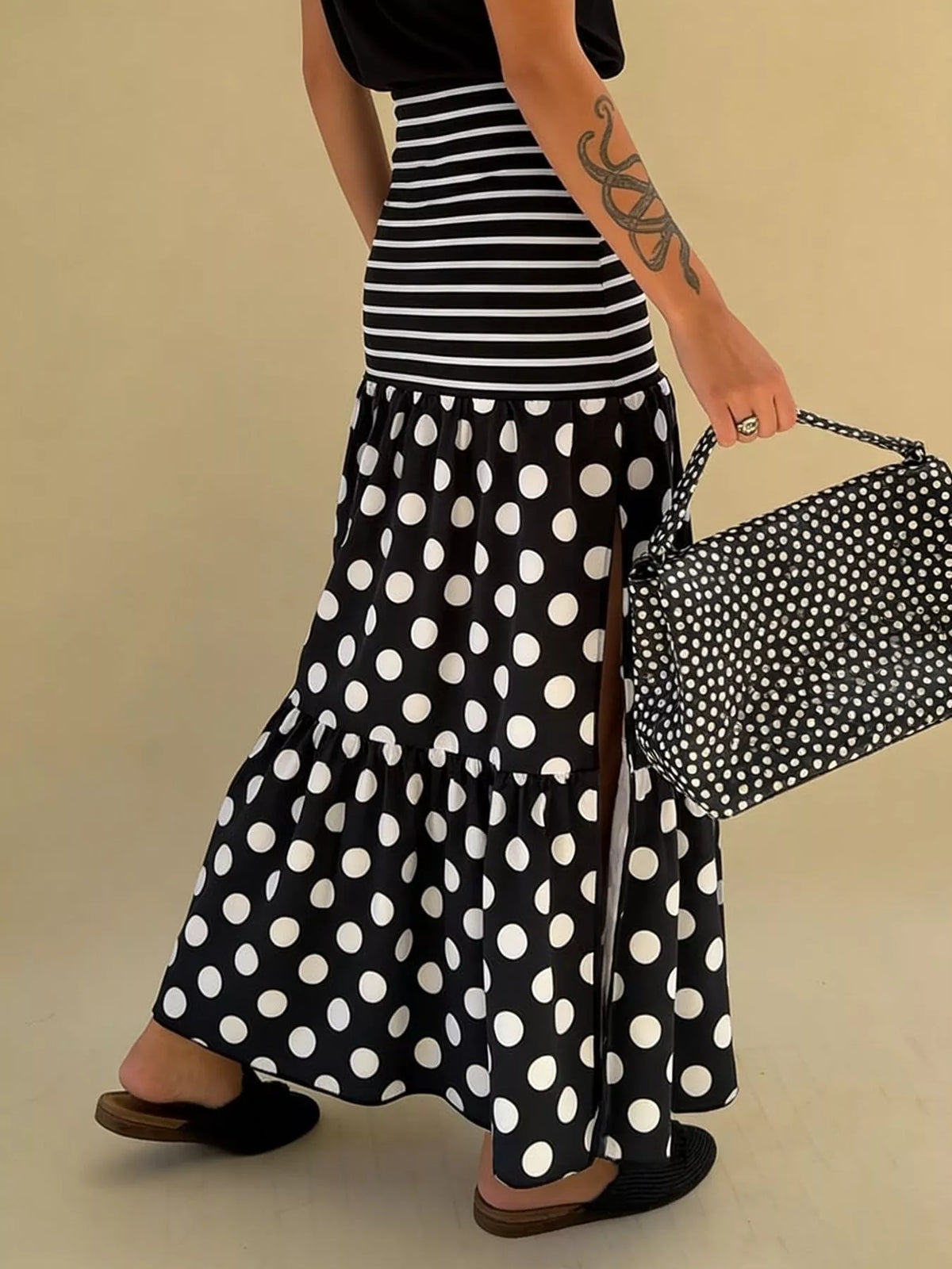 Polka dot striped slit maxi skirt in black back view