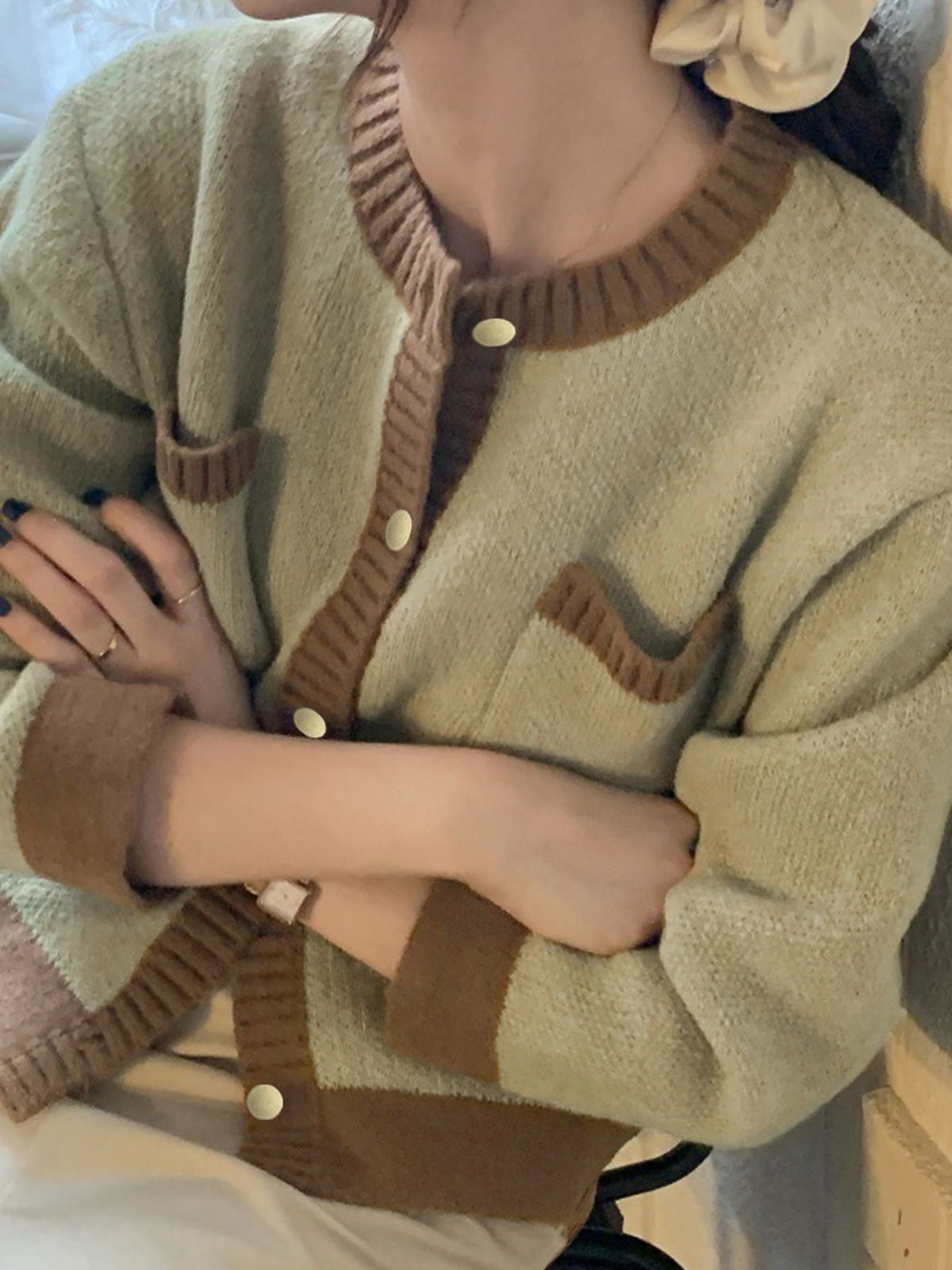 Contrast trim cardigan trim closeup