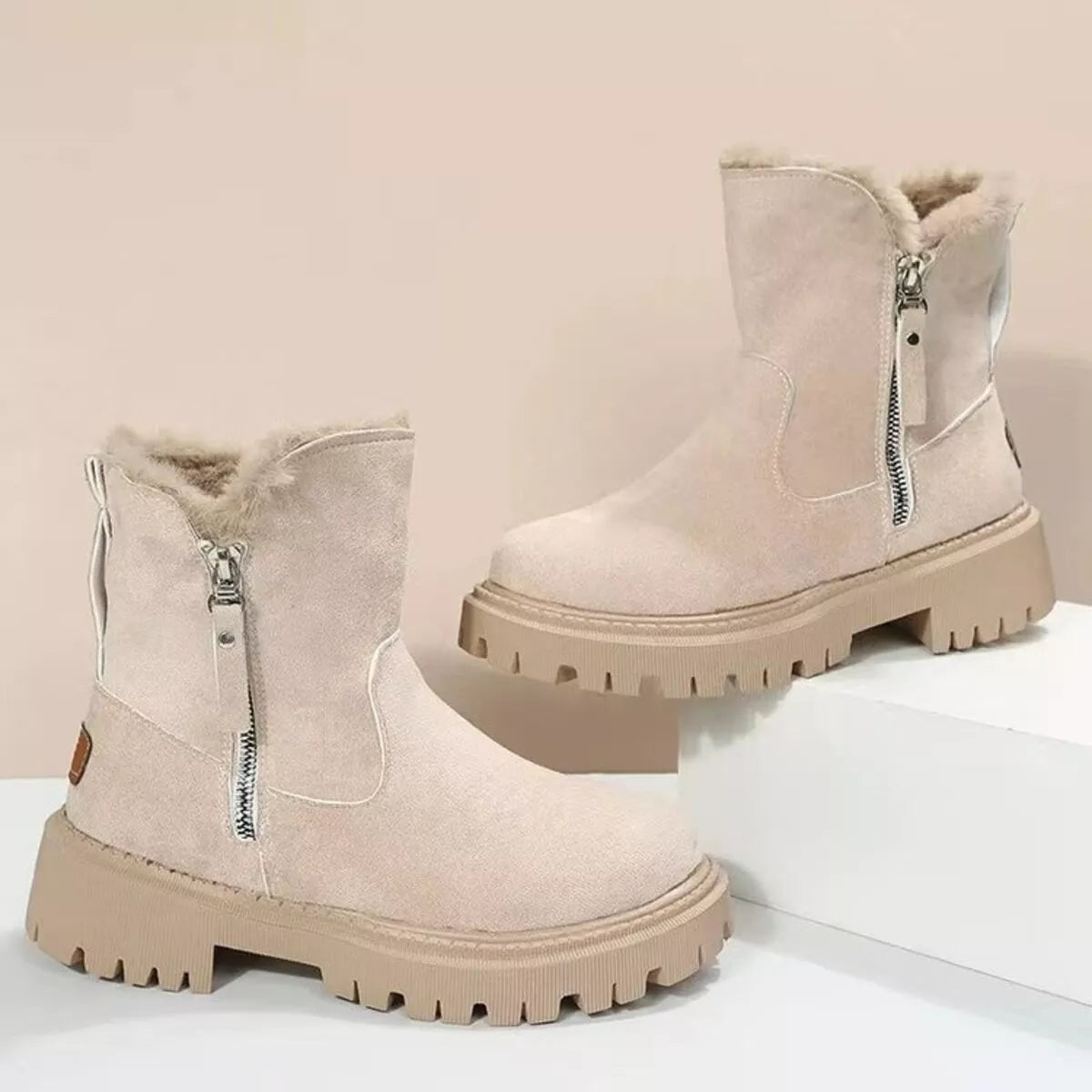 Fuzzy lined suede ankle boots upper close up