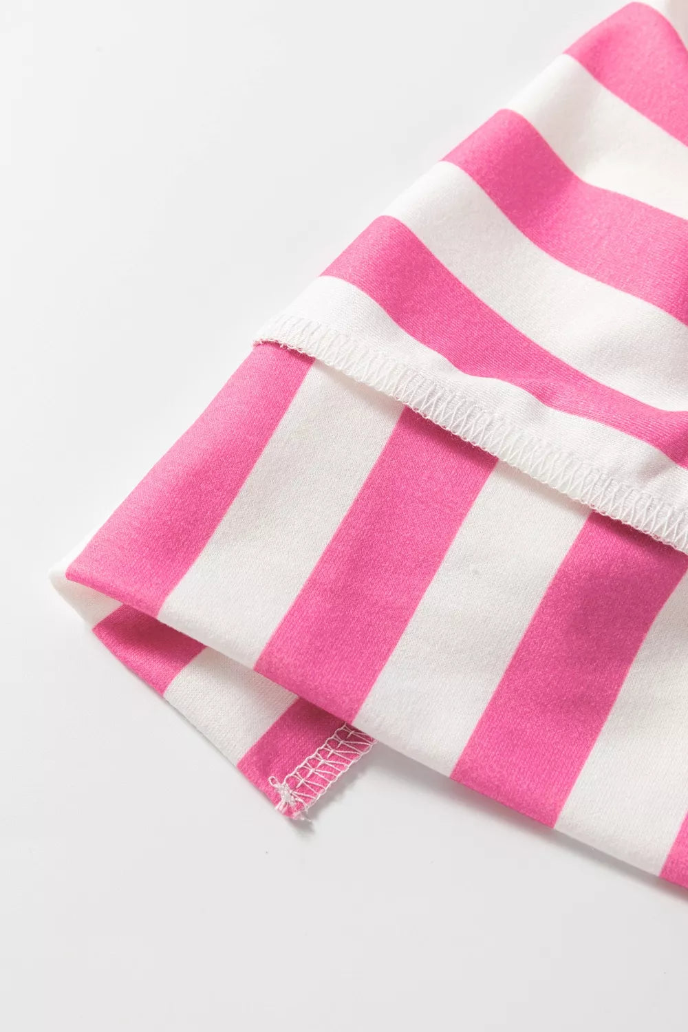 Fabric texture close up of the striped patchwork womens top