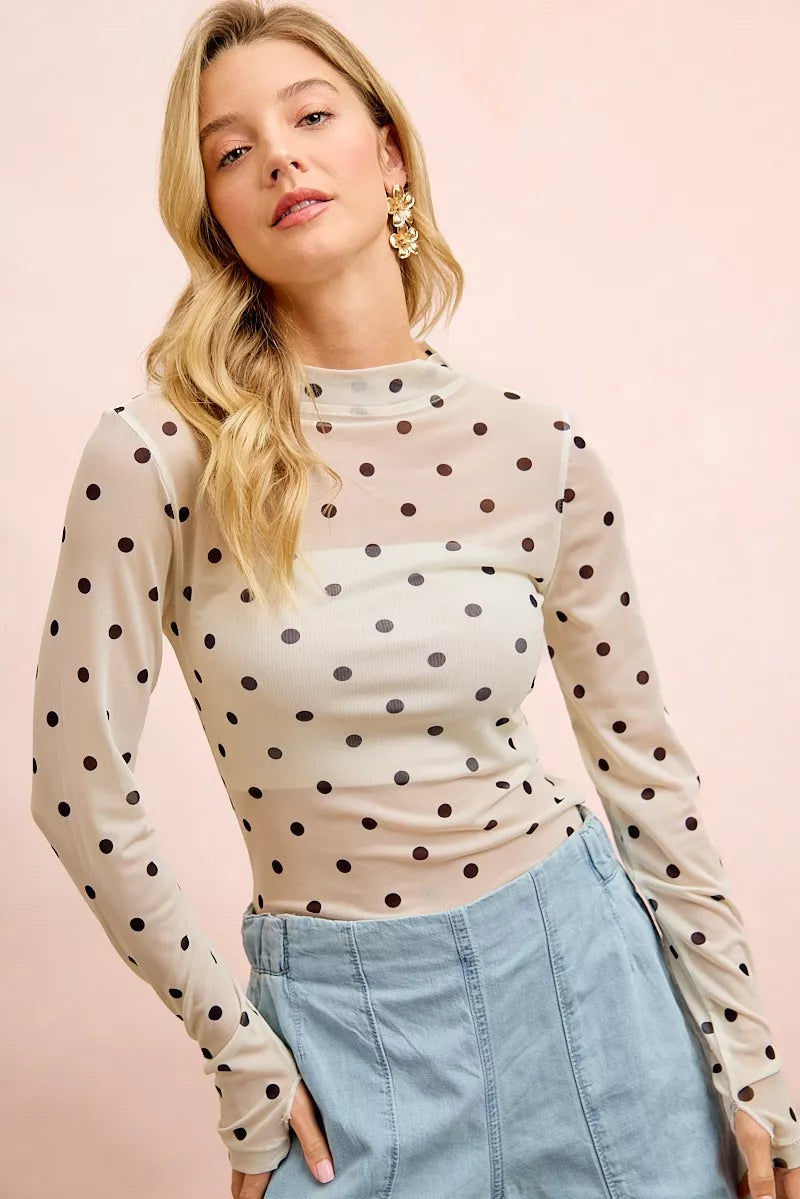 Ivory and black polka dot mock neck sheer mesh top front view