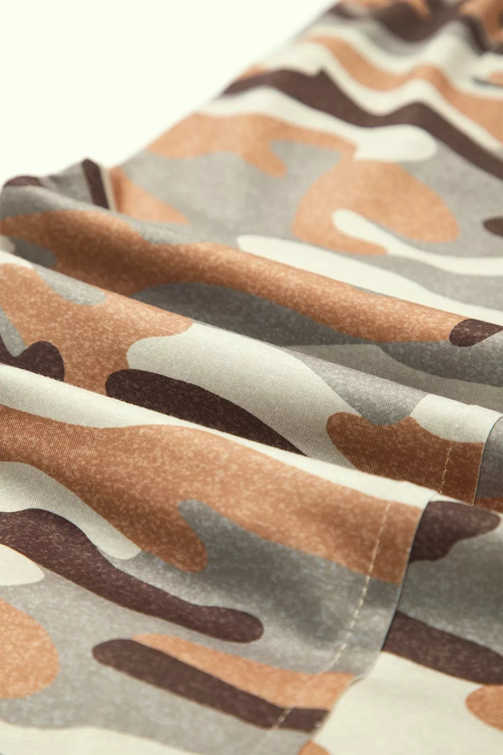 Taupe camo jogger pants flat lay view
