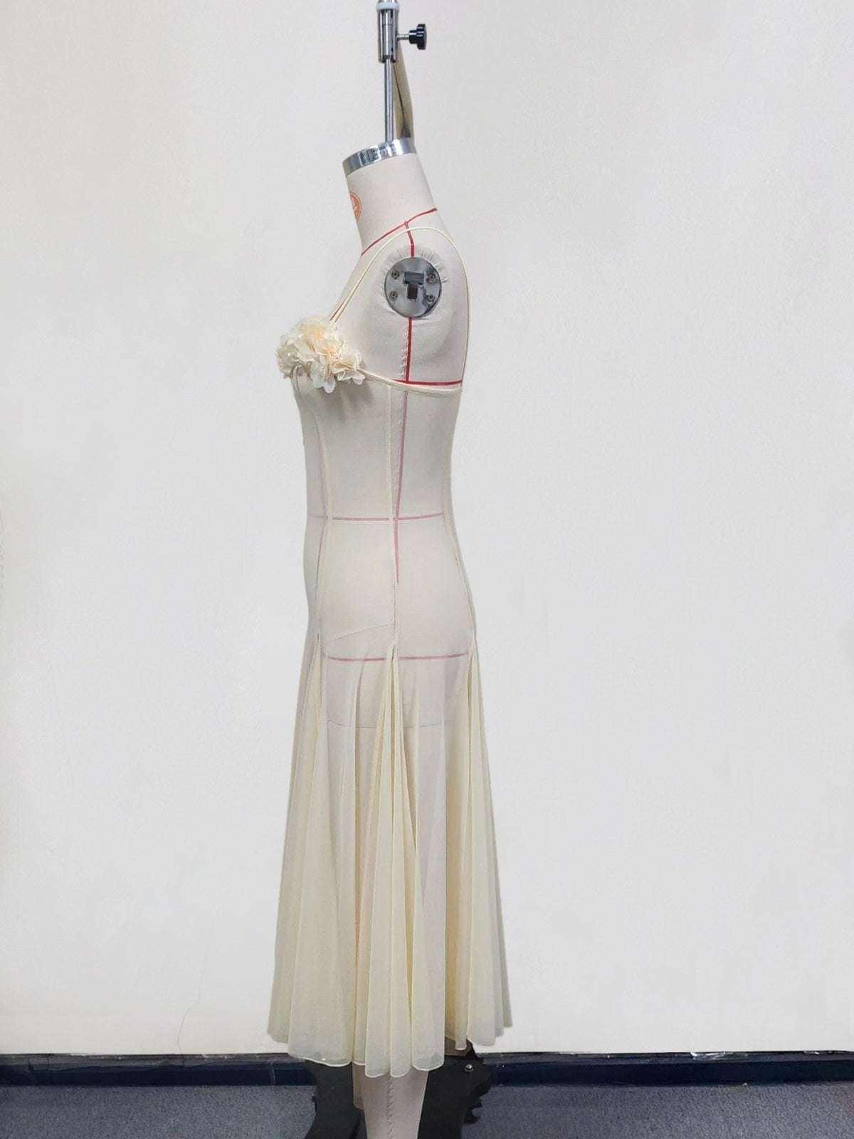 Side view showing the length of the yellow dress