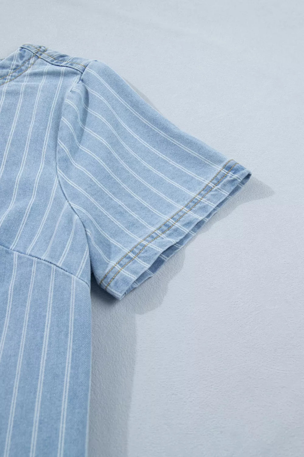 Light blue striped button back denim mini dress, back detail