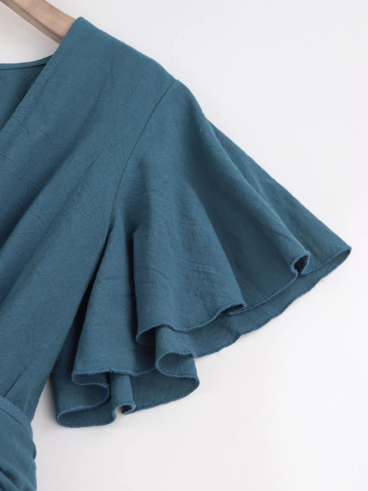 Tie waist flutter sleeve romper, detail view