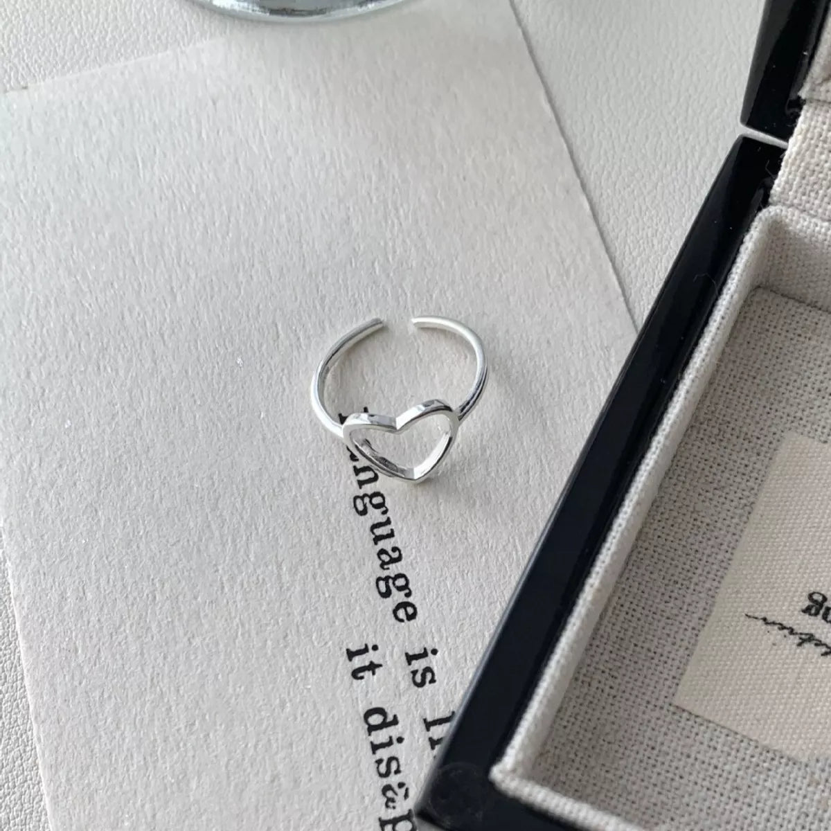 Sterling silver heart open ring side profile view