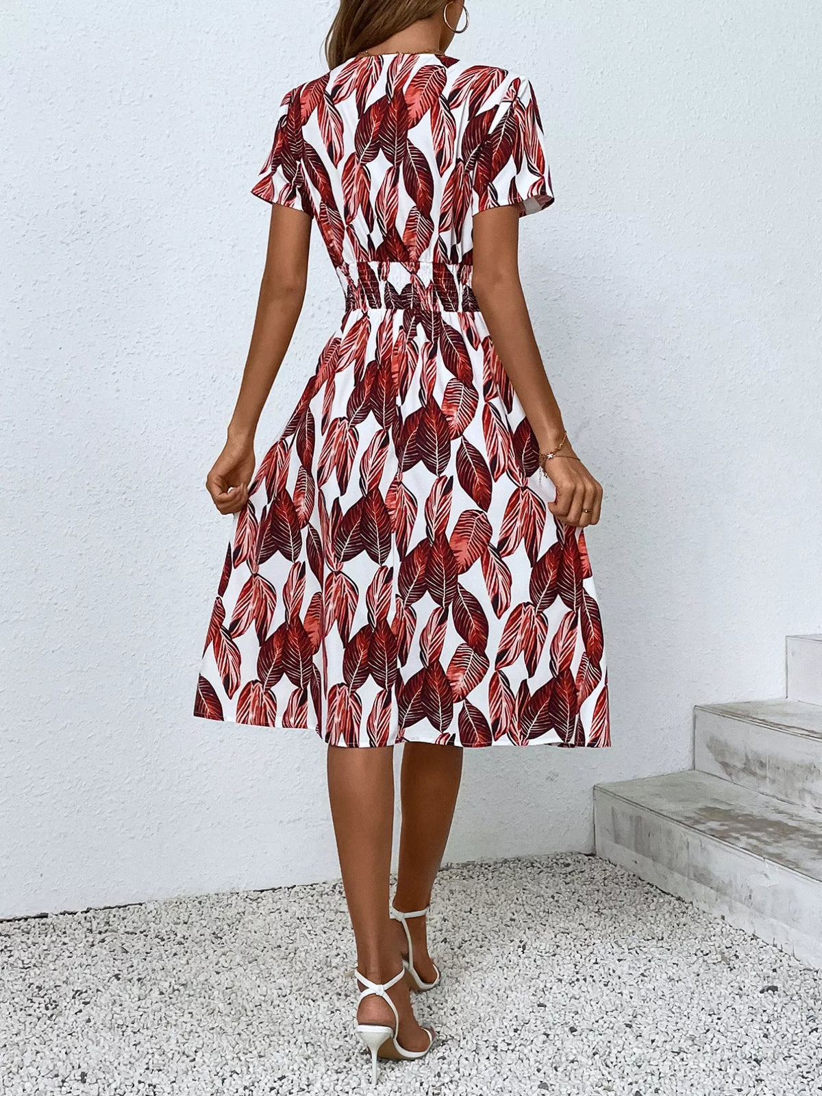 Printed short sleeve smocked midi dress back view