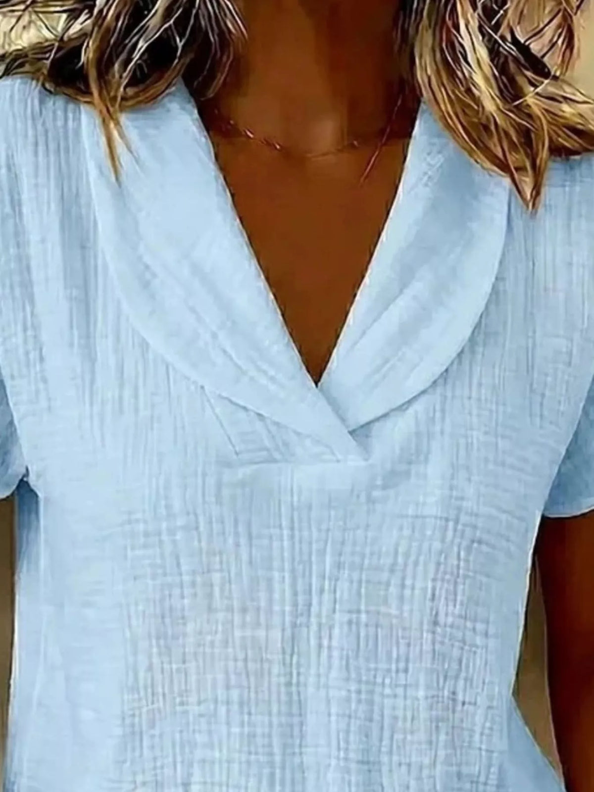 Textured short sleeve blouse colour range displayed