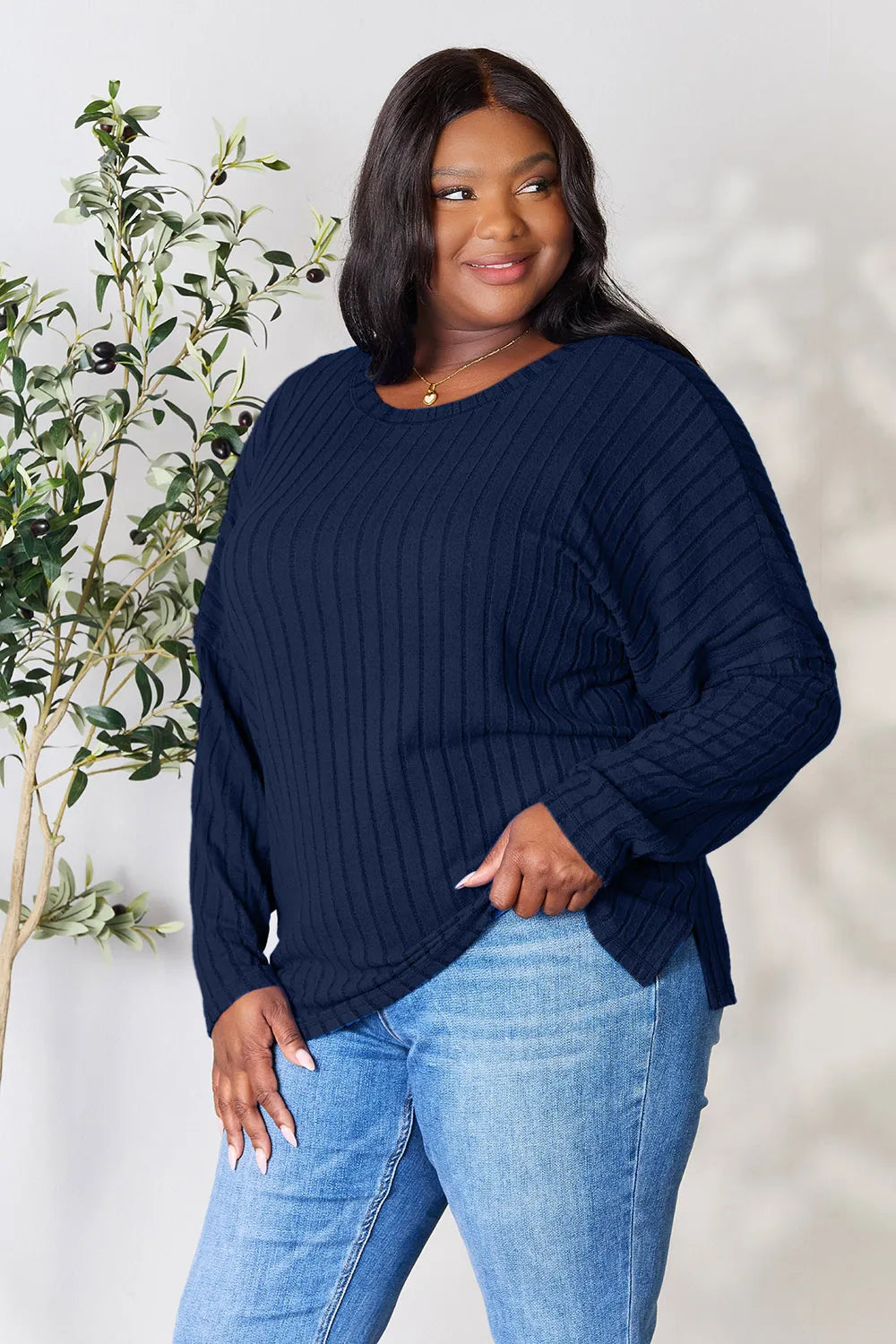 Detail of round neckline on ribbed top