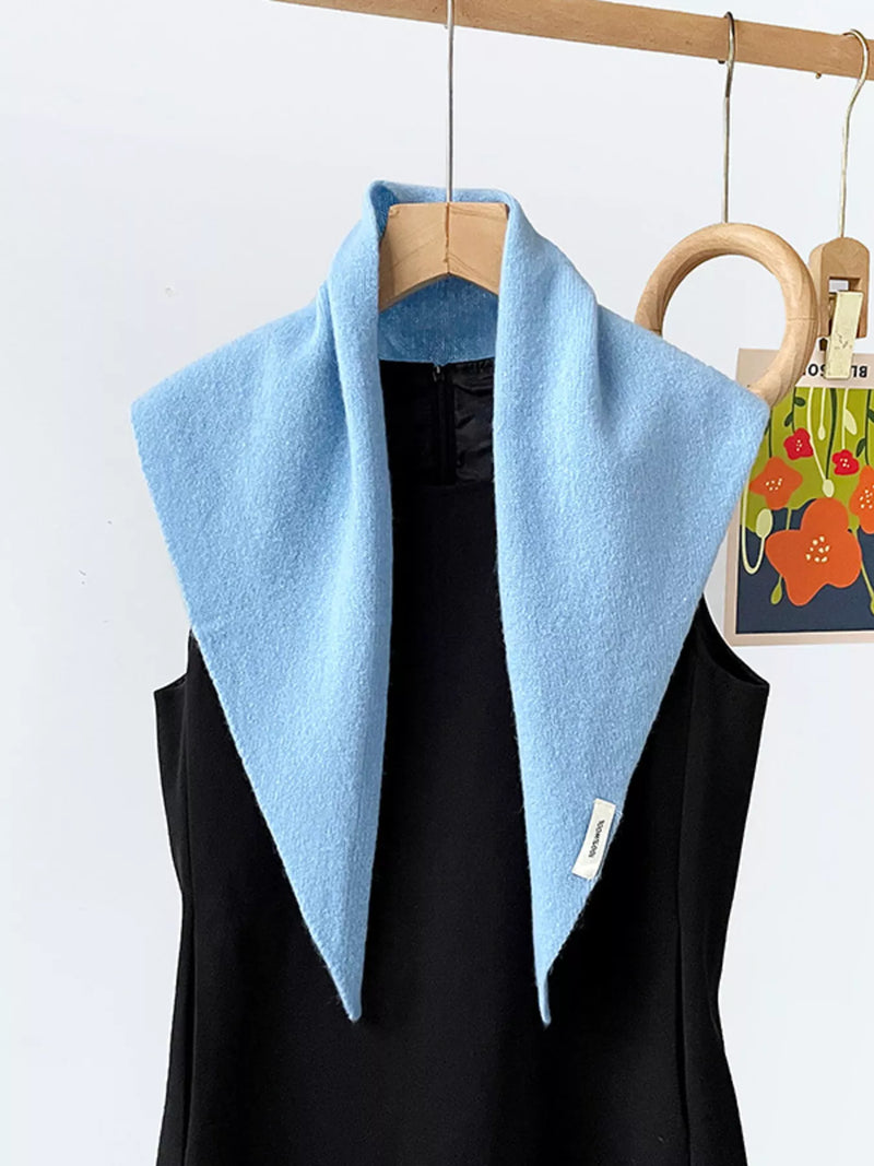 Wool knit scarf draped around the neck