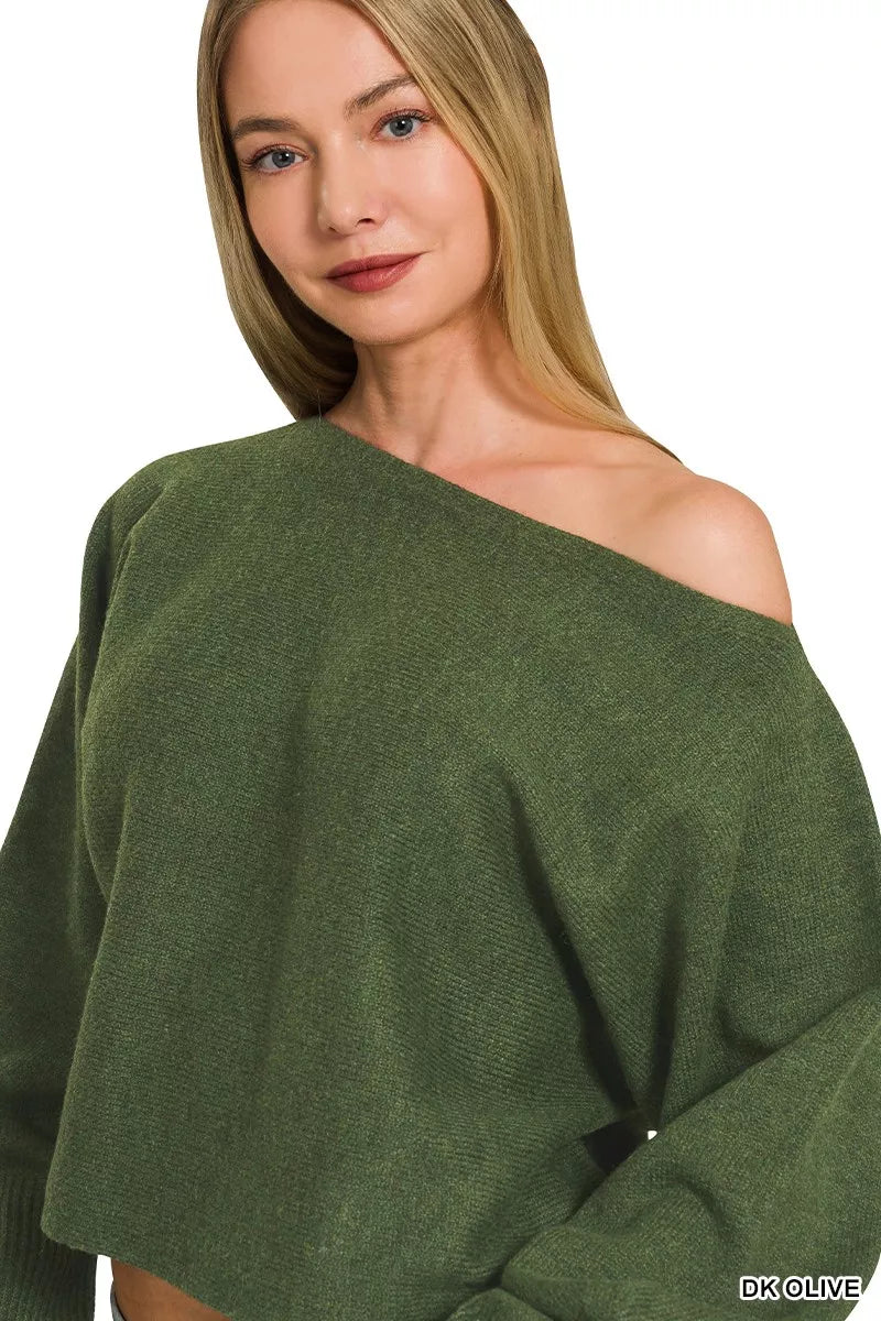 Soft knit boat neck sweater styled with denim