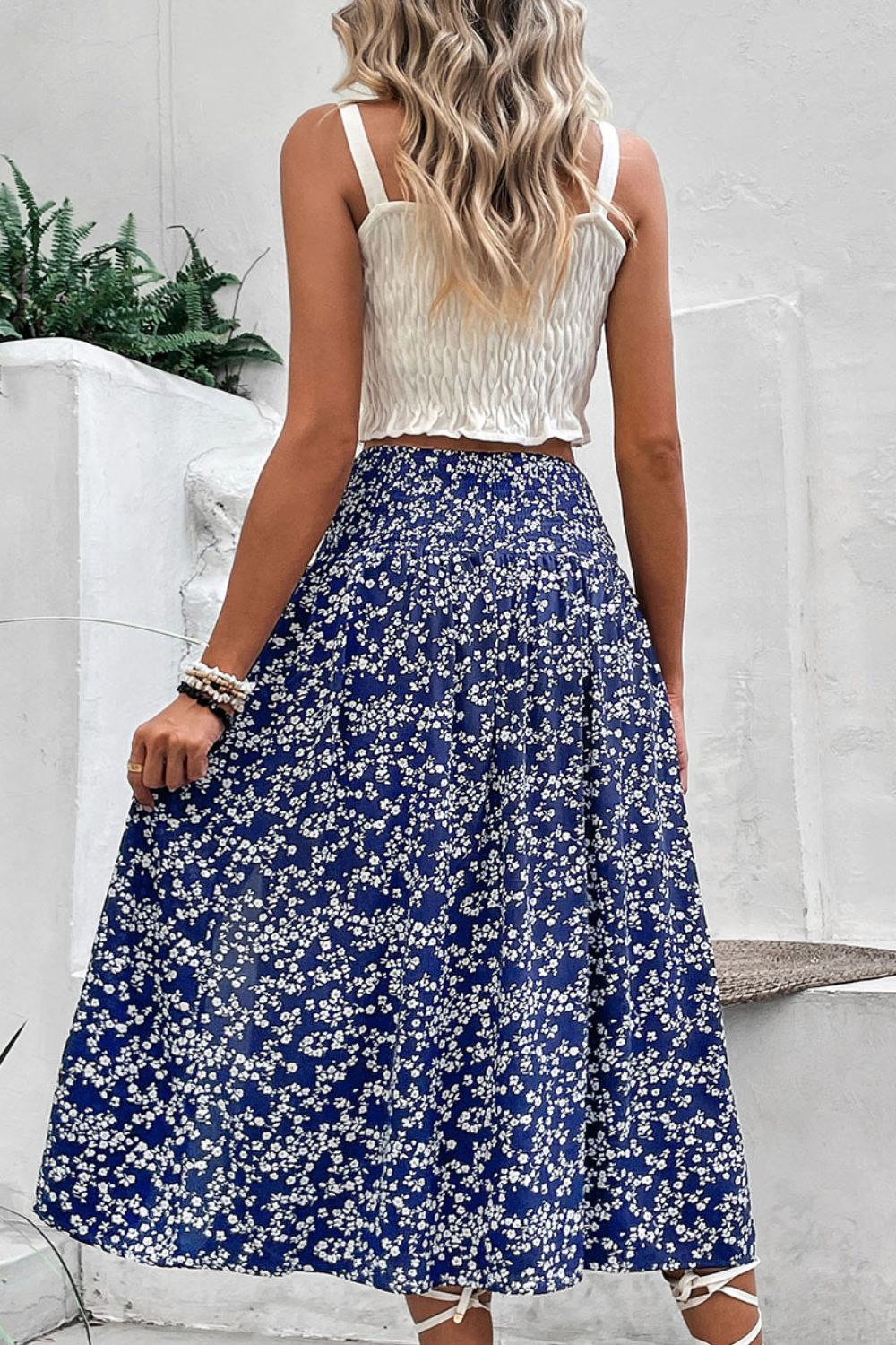 Floral midi skirt showing side slit detail