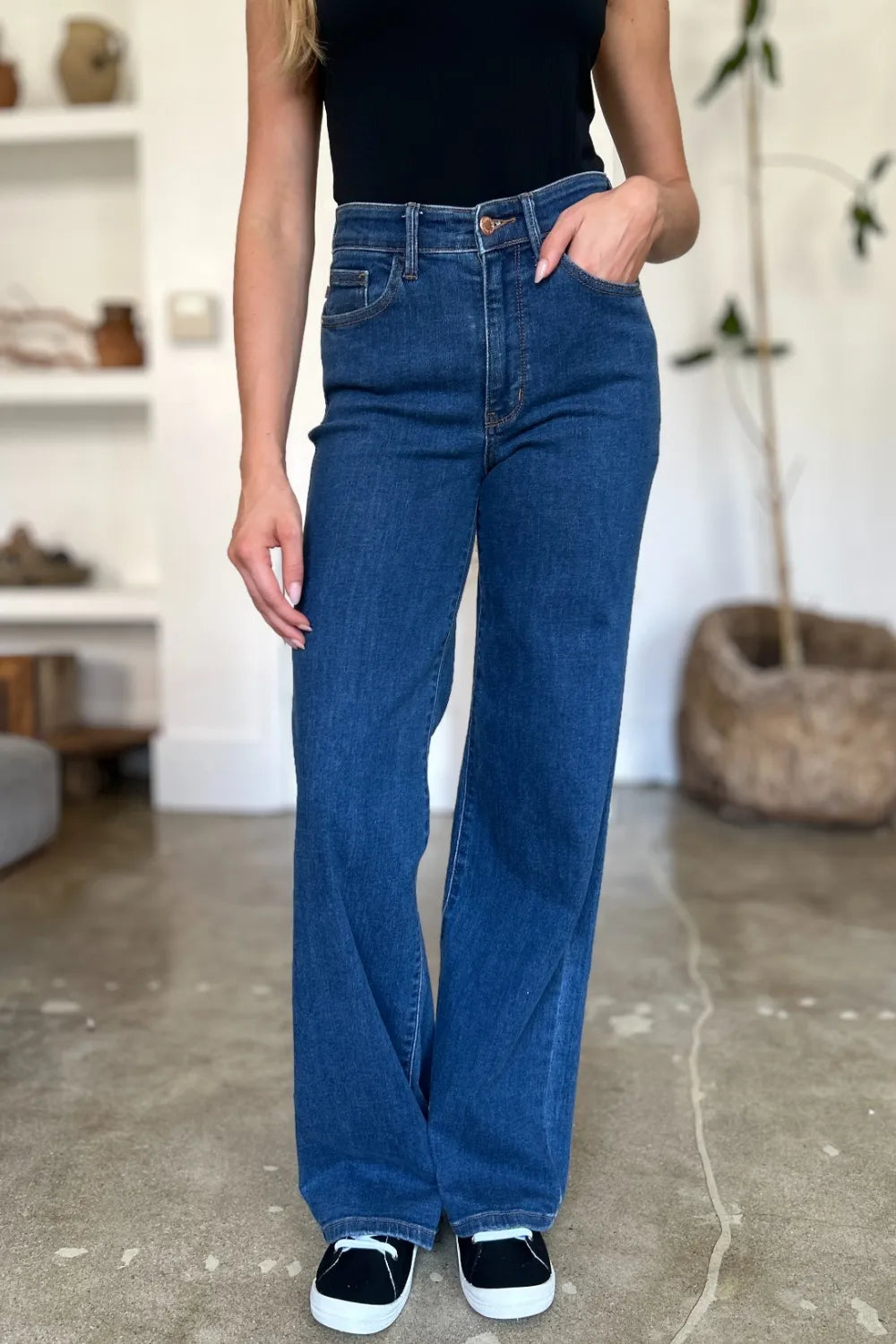 Three quarter view of the high rise jeans