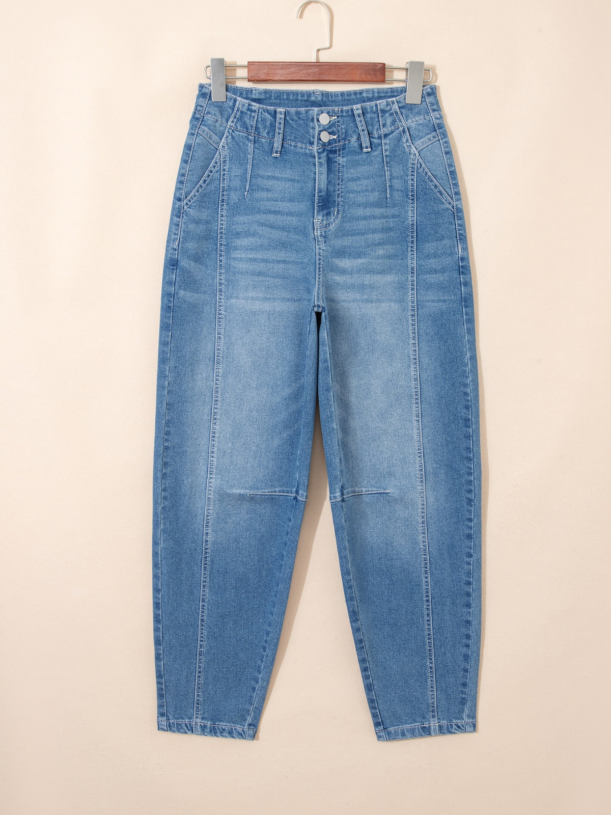 Medium wash barrel leg denim back view