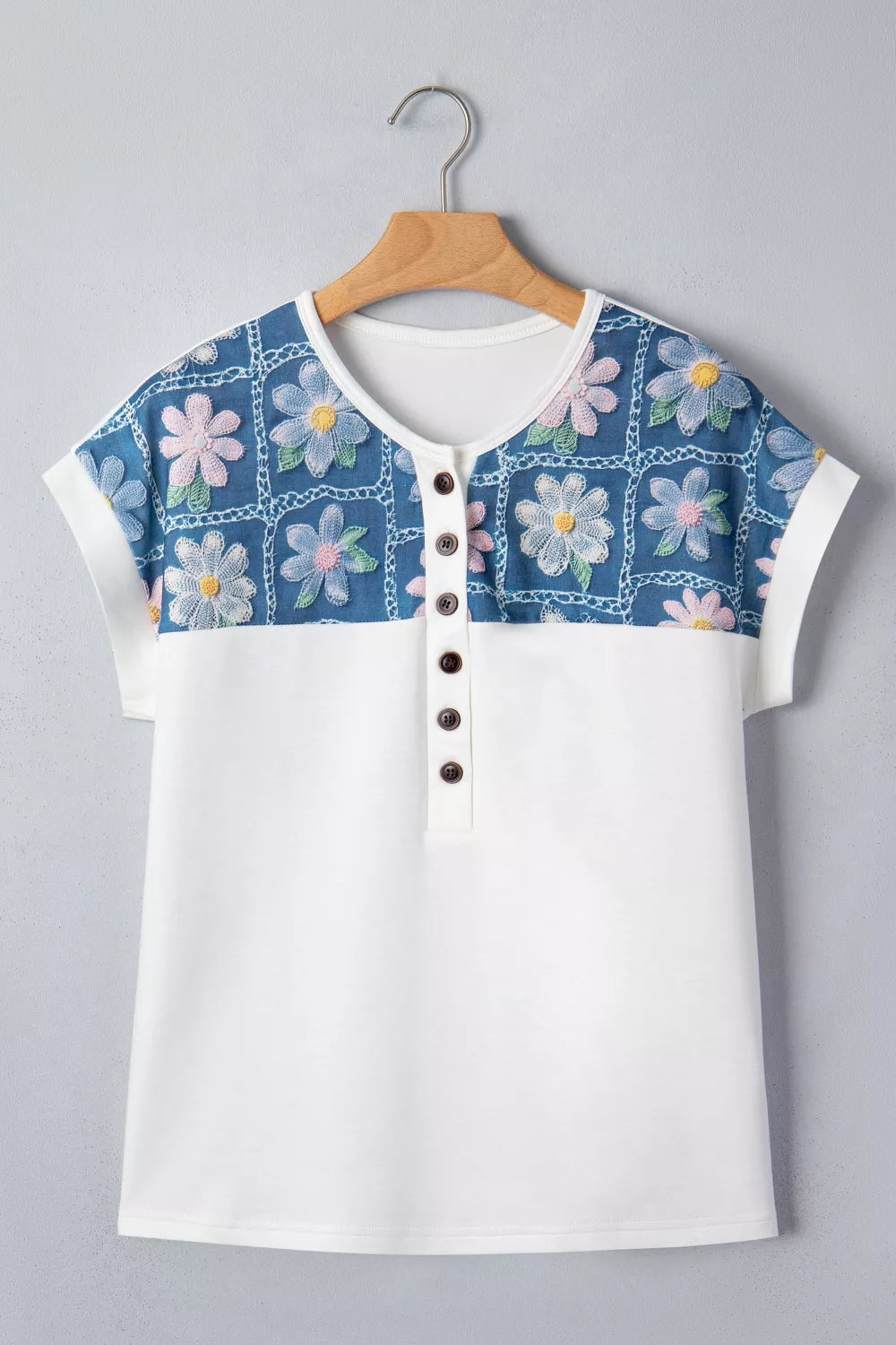 White floral tee button detail