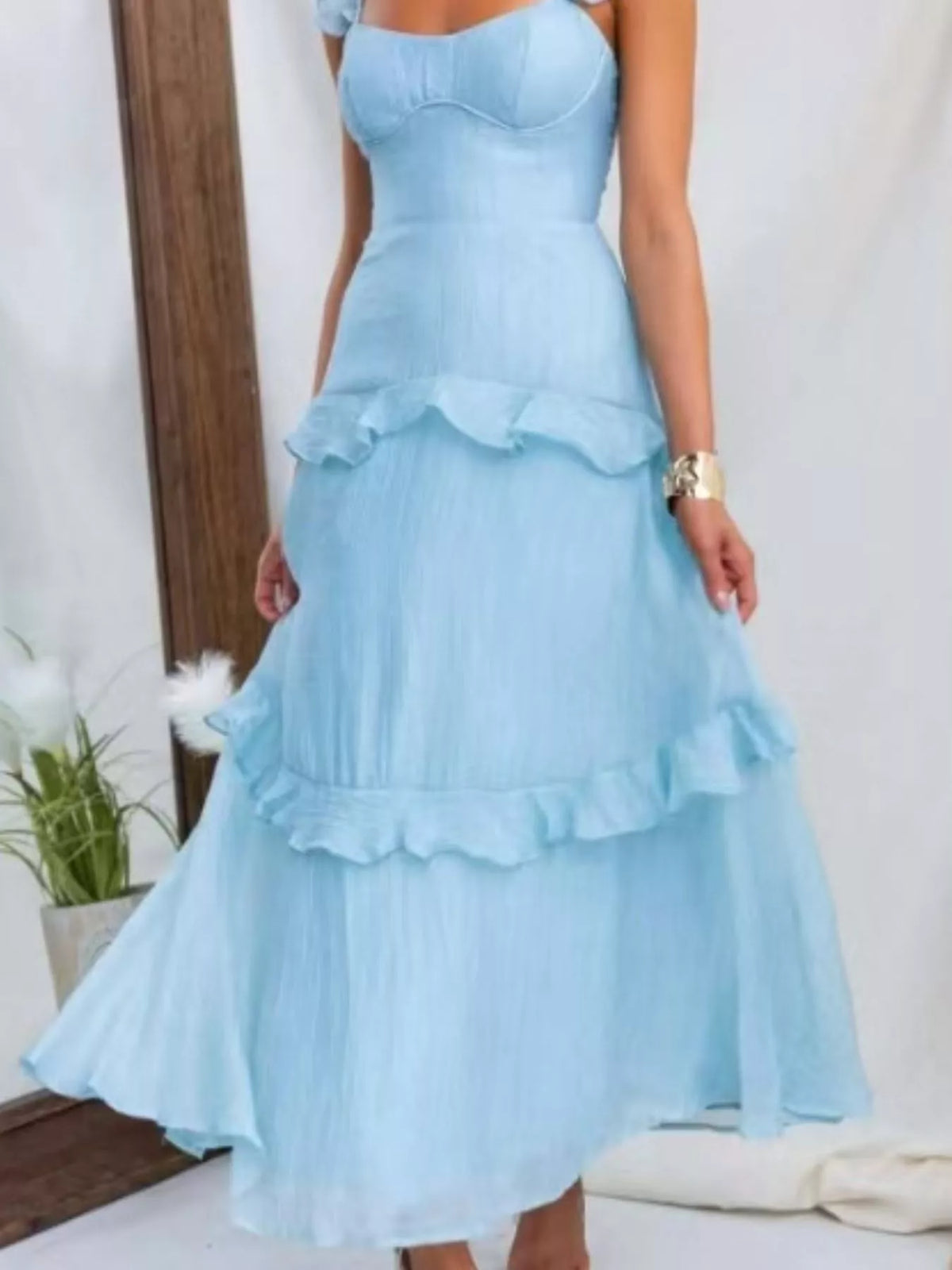 Ruffled maxi dress side view showing drape
