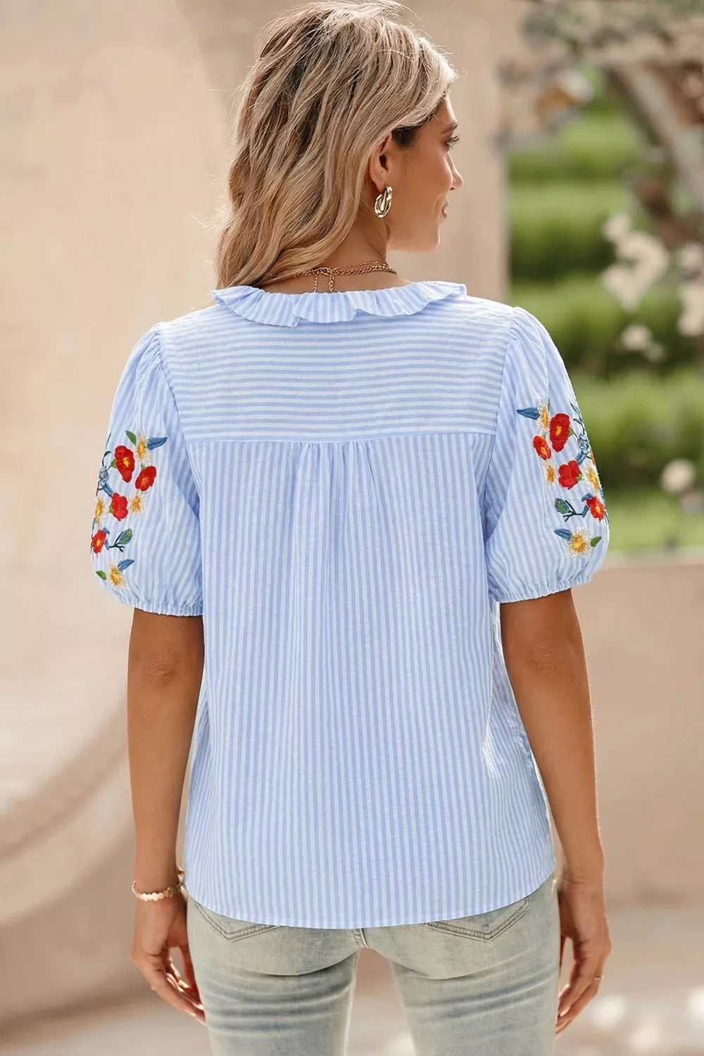 Light blue striped floral embroidered puff sleeve shirt styled view
