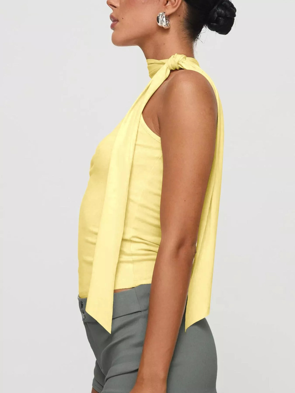 Halter neck crop top hem detail