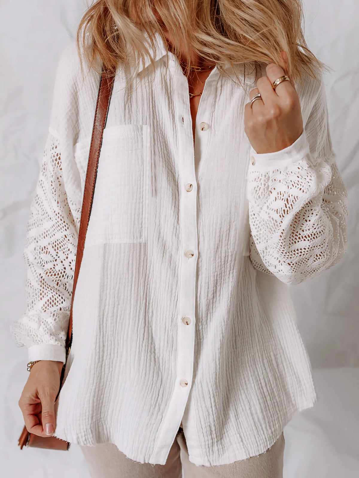 White shirt chest pocket and button detail