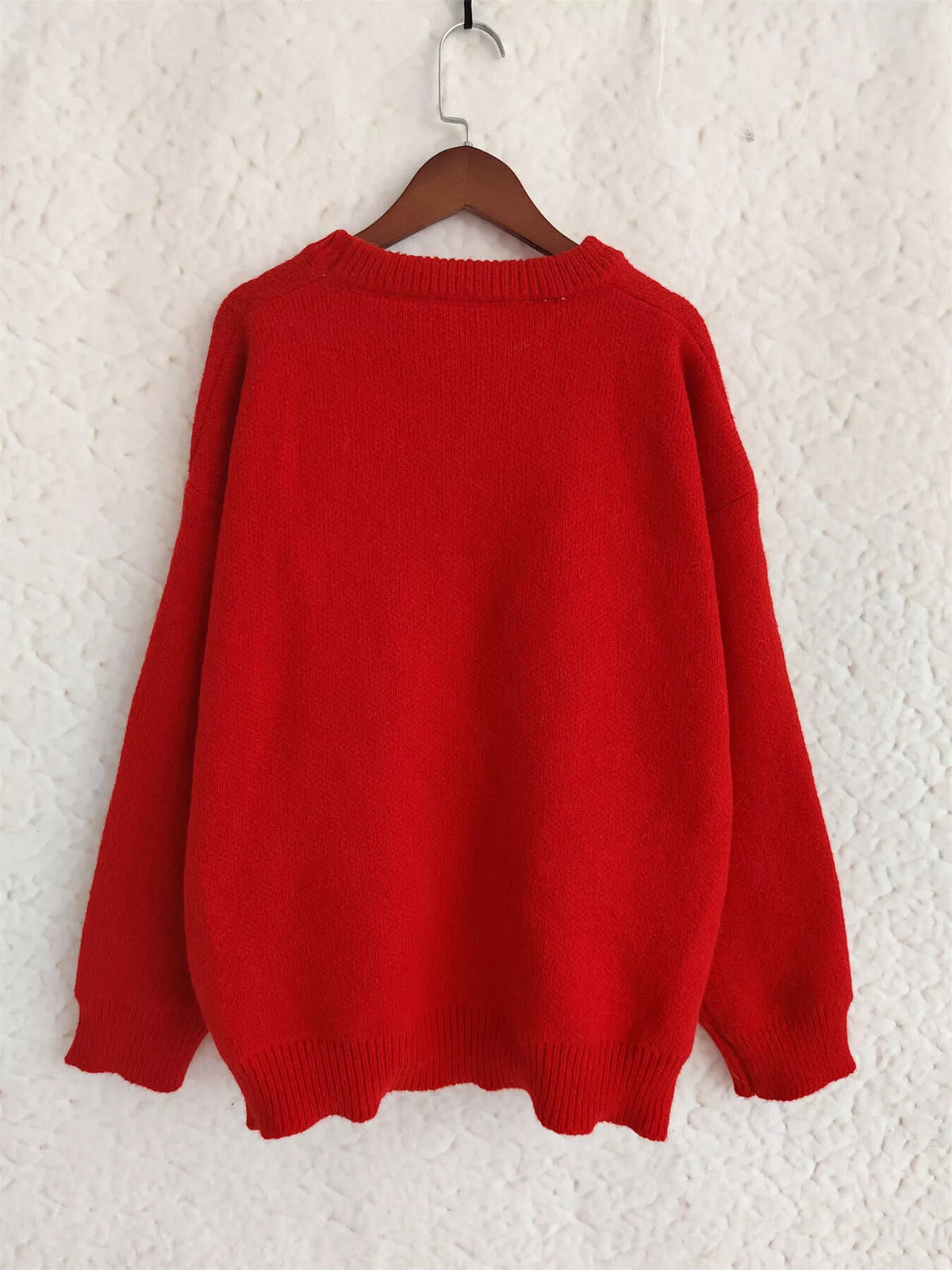 cherry pom pom round neck knit sweater styling detail