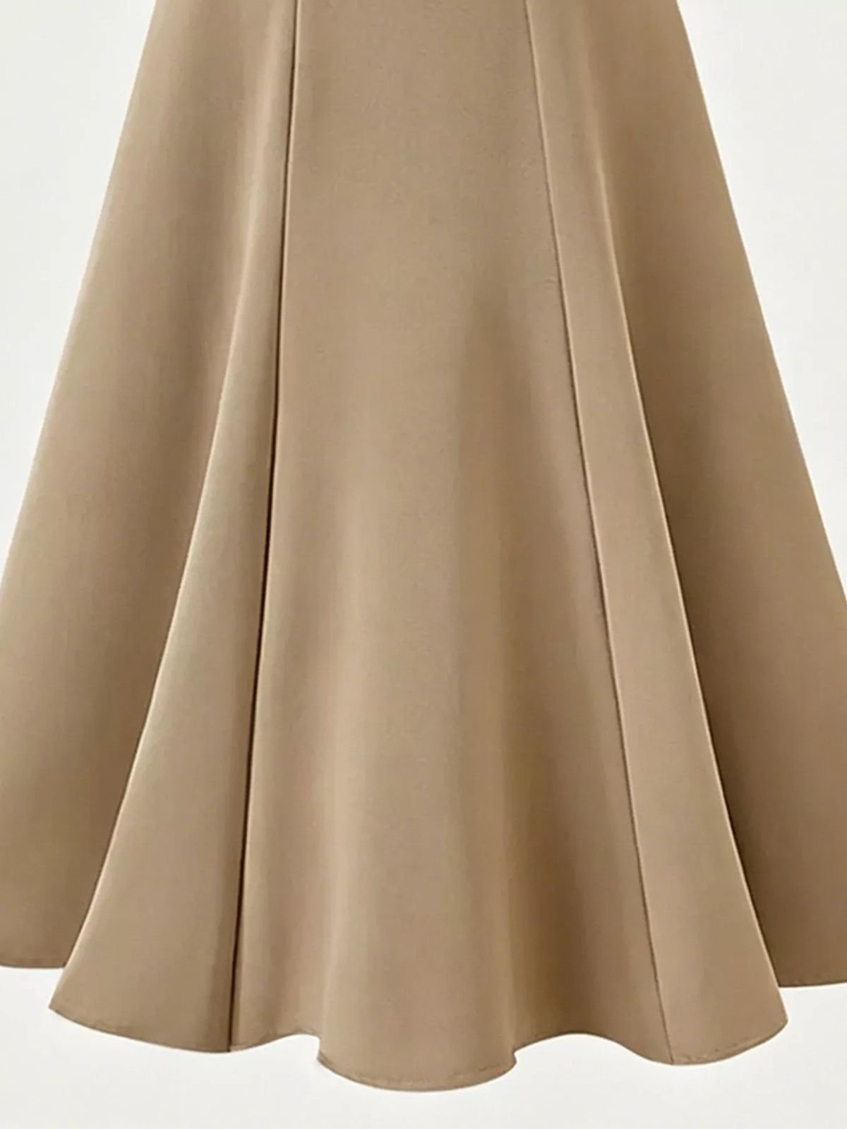 Pleated midi skirt in black shown on a model