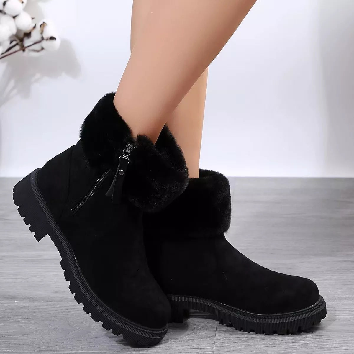 Fuzzy lined ankle boots heel and sole detail