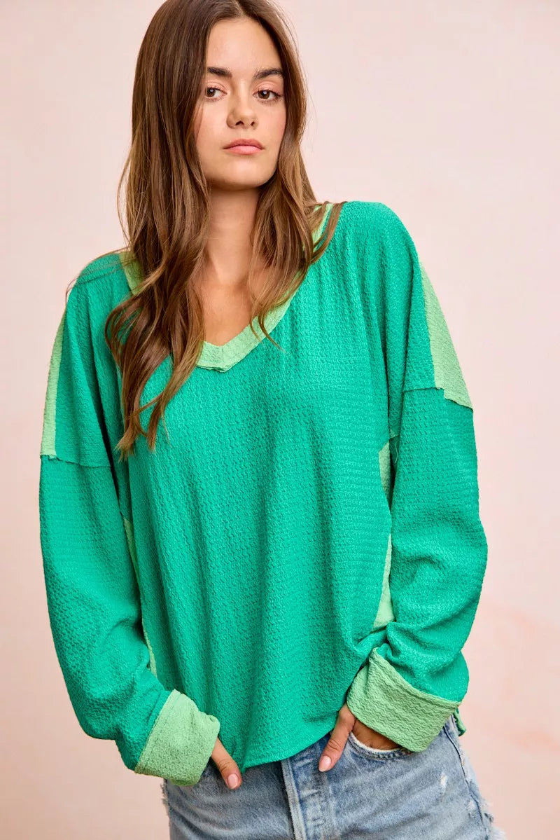 BiBi emerald and light green color block textured top styled on model