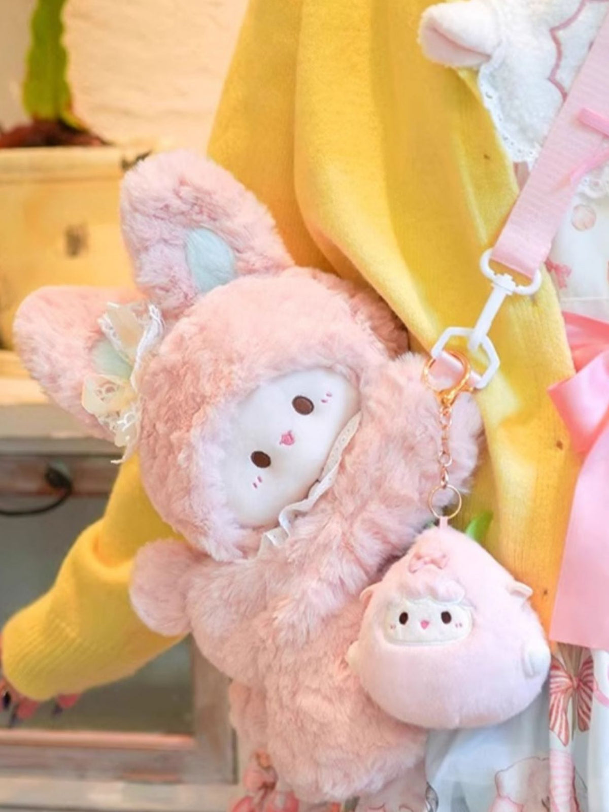 Blush pink plush bunny backpack zip and hardware detail