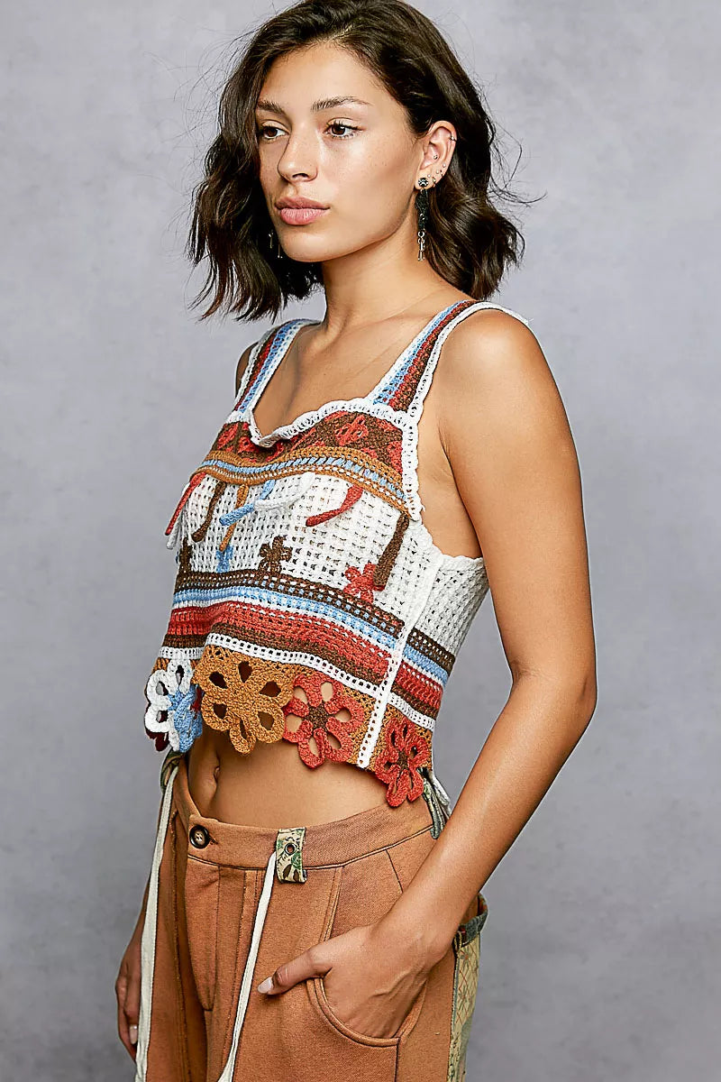 Sleeveless crochet crop top with dangle detail side view