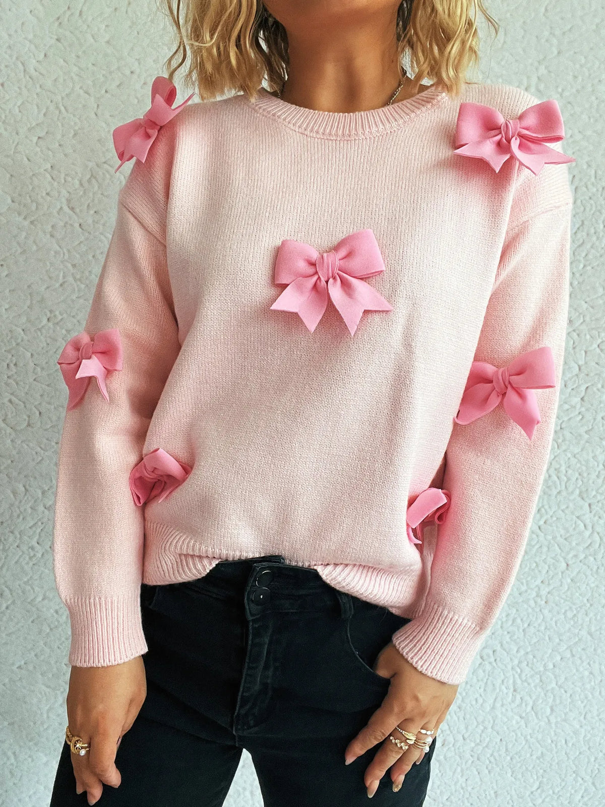 Bow round neck long sleeve sweater on model