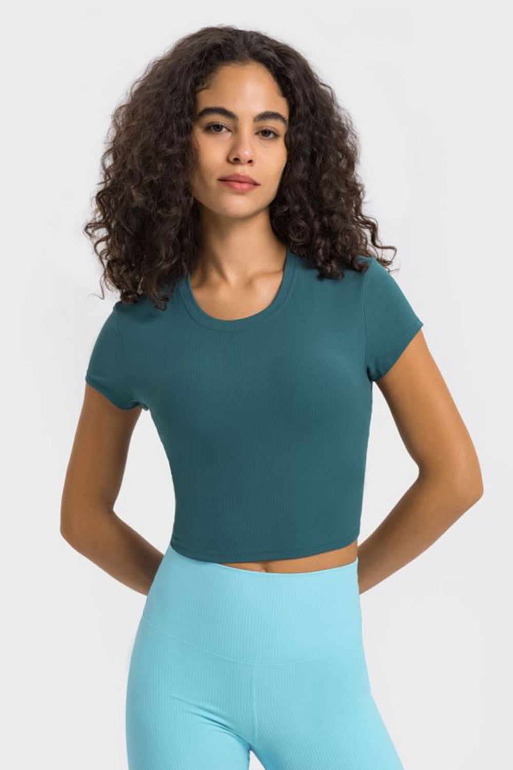 Round neck cropped sports t-shirt profile view