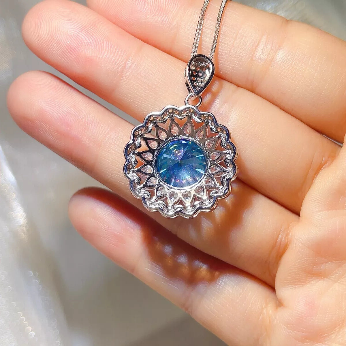 Moissanite necklace displayed with its matching gift box